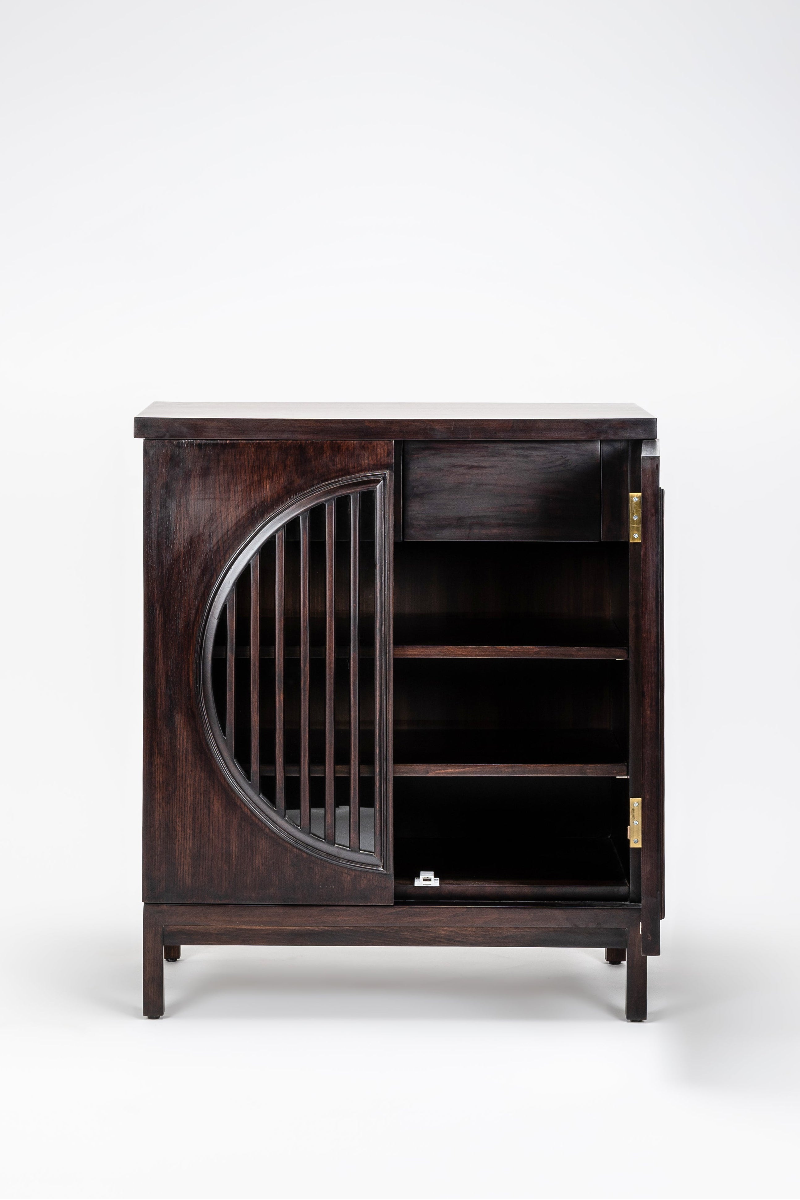 Dark wooden cabinet with curved design on a white background