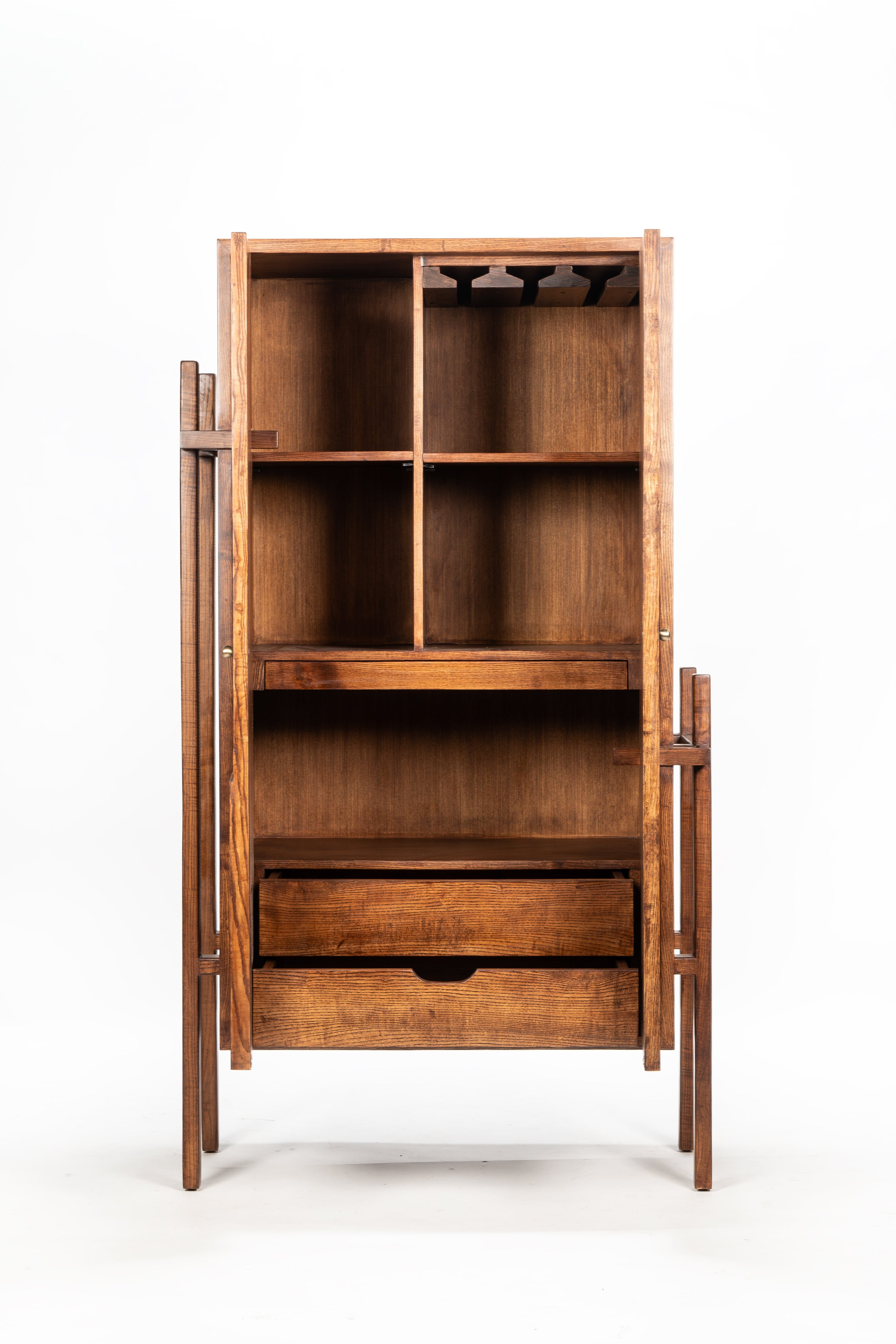 Wooden bookshelf with open doors on a white background