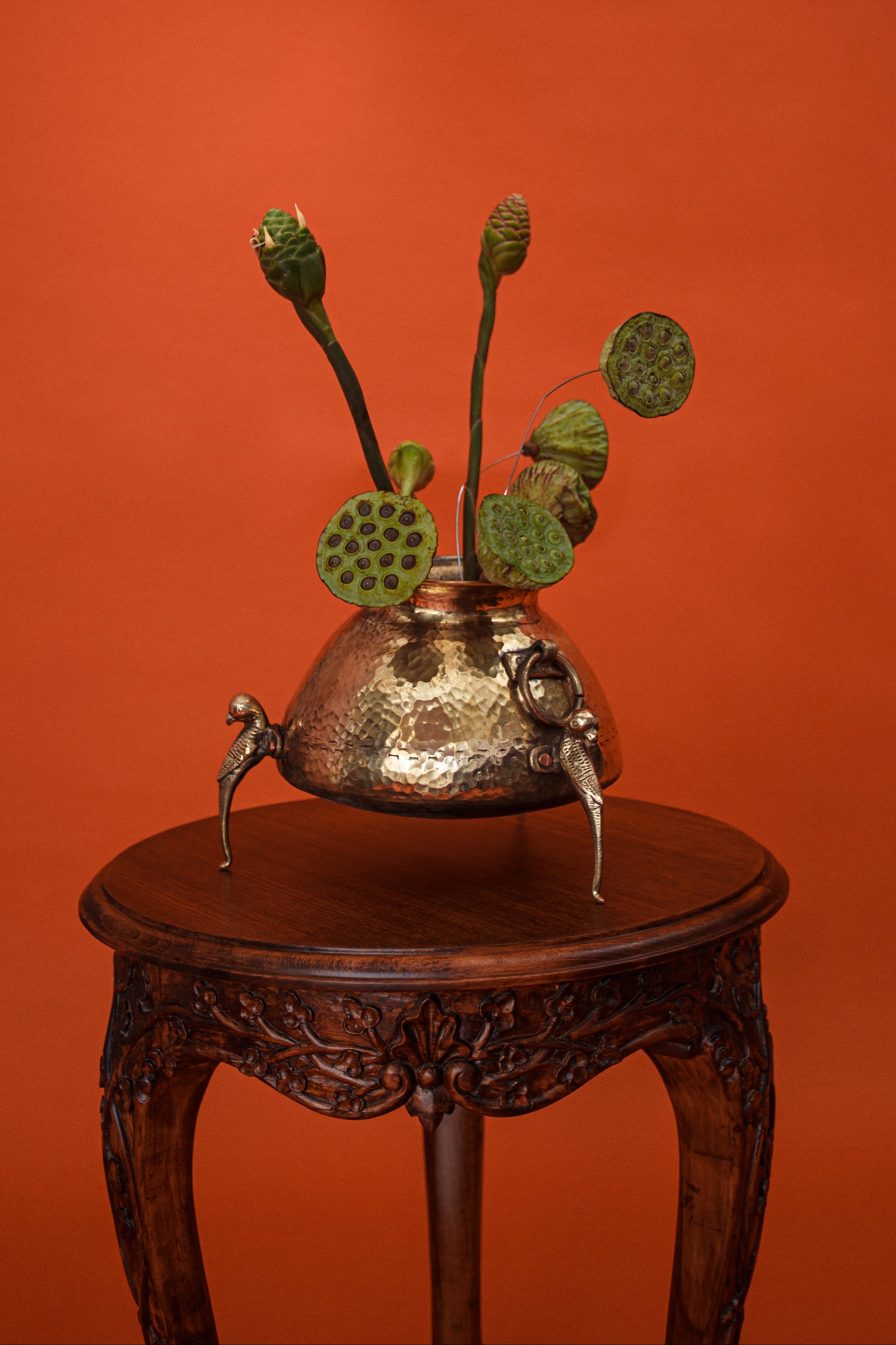 Chandelier with round lights on an orange background