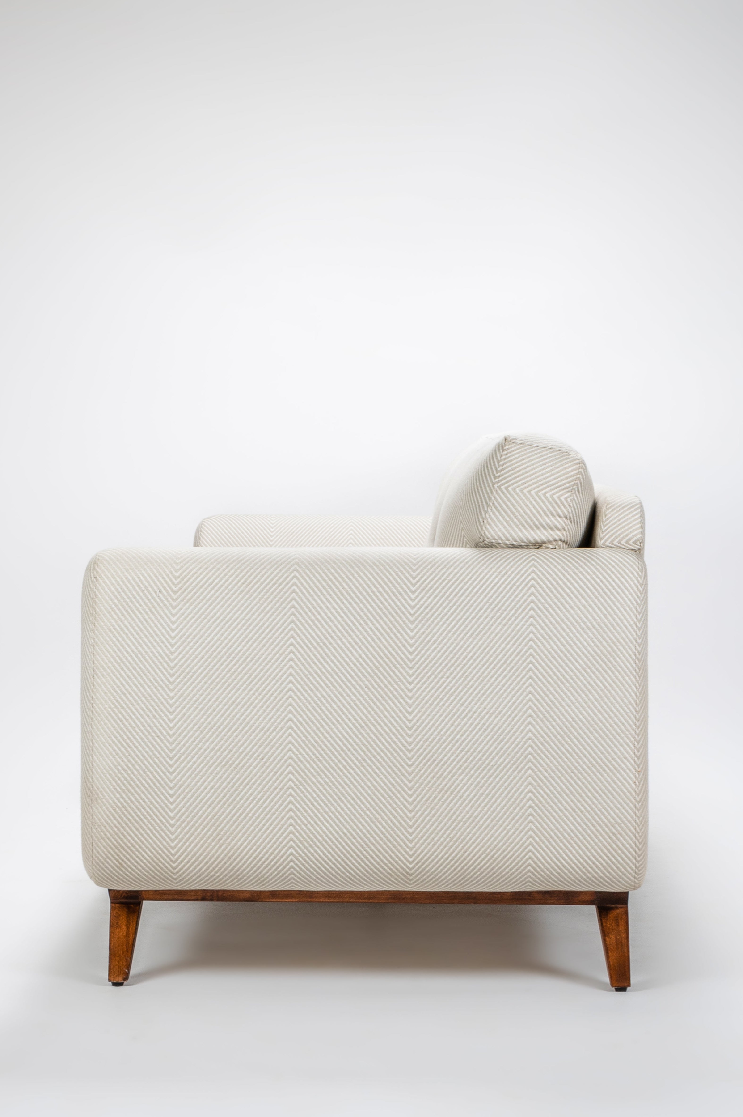 Beige armchair on a white background