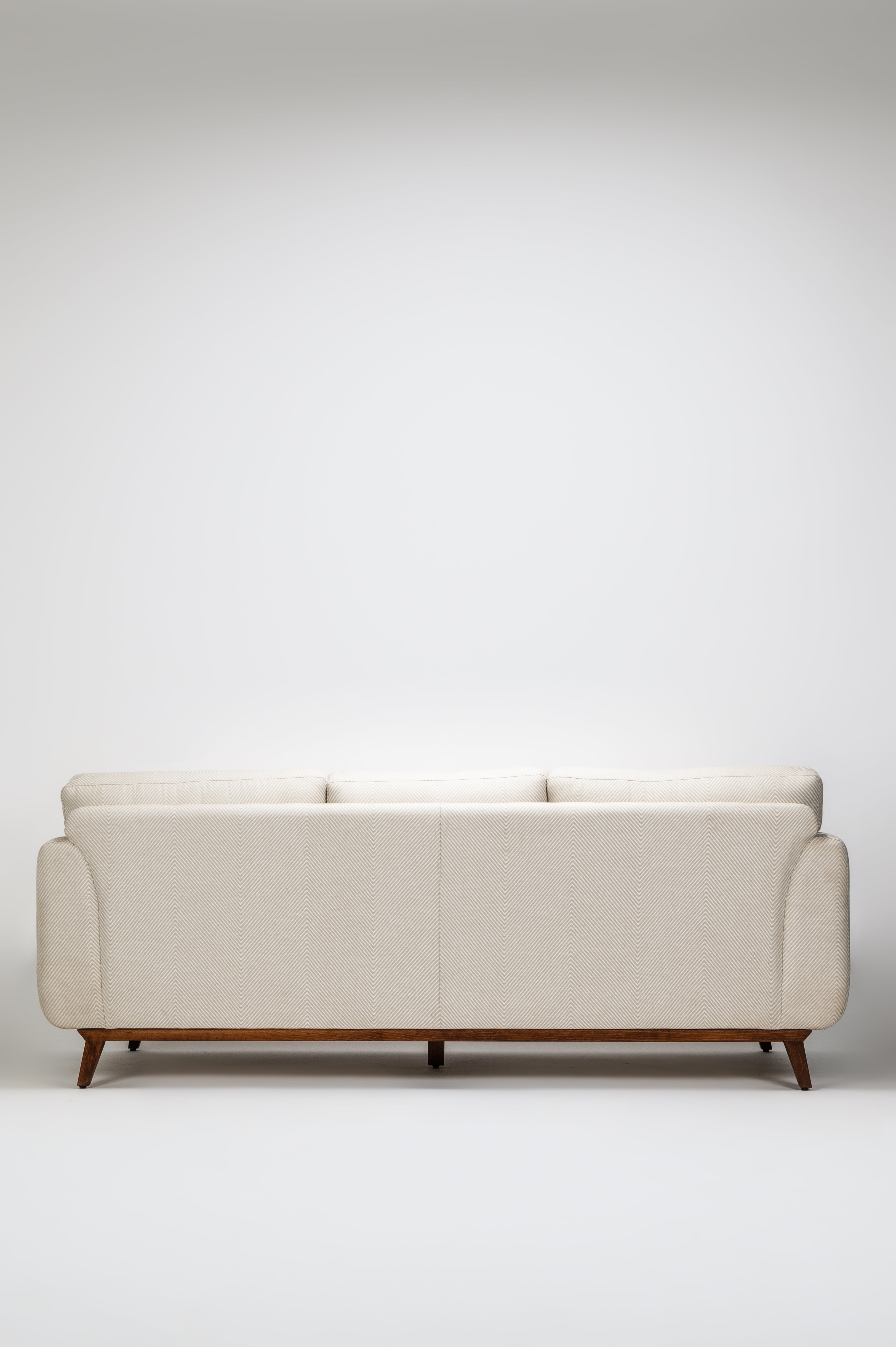 Beige sofa on a white background
