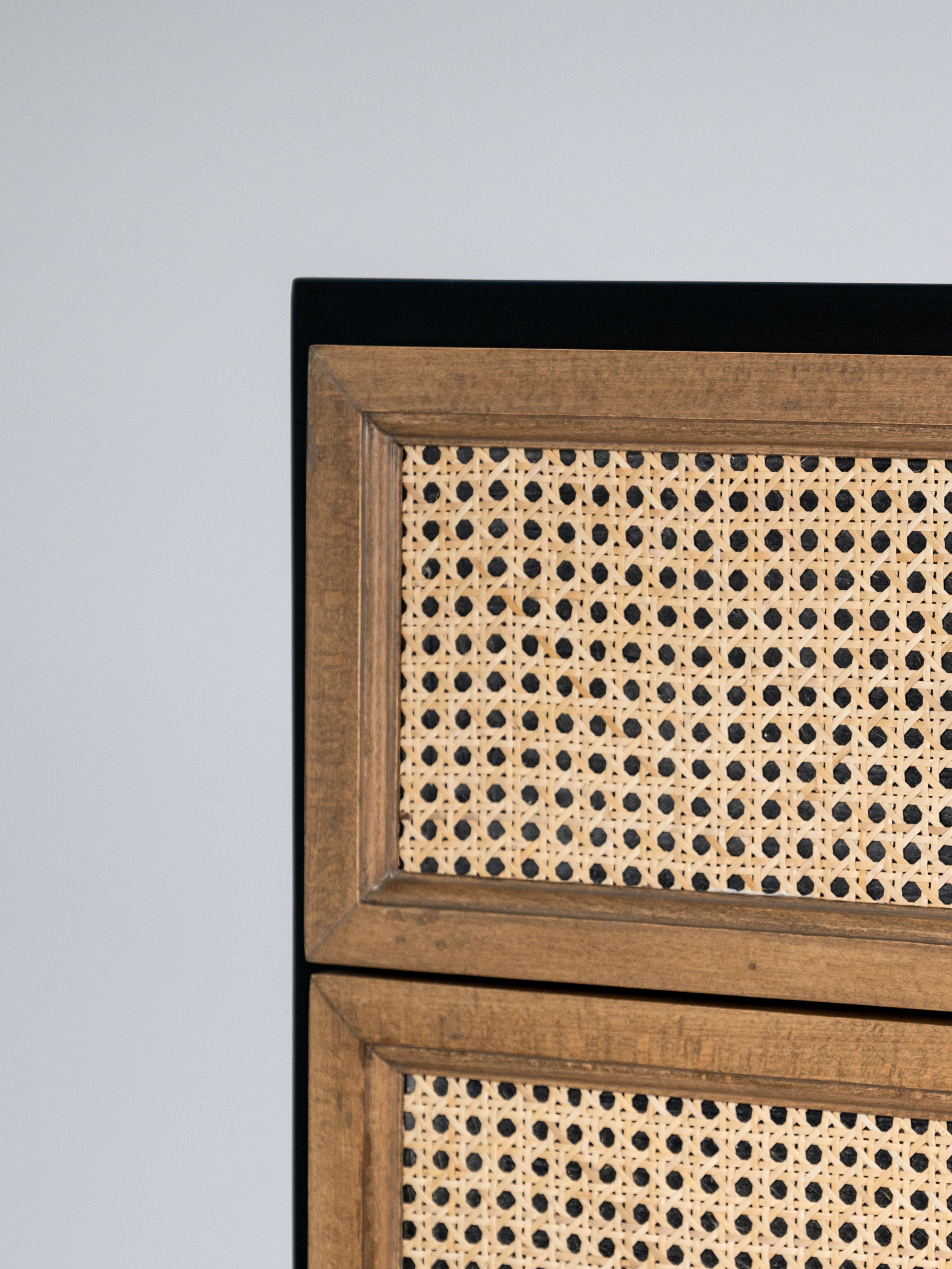Wooden cabinet with rattan pattern on a gray background