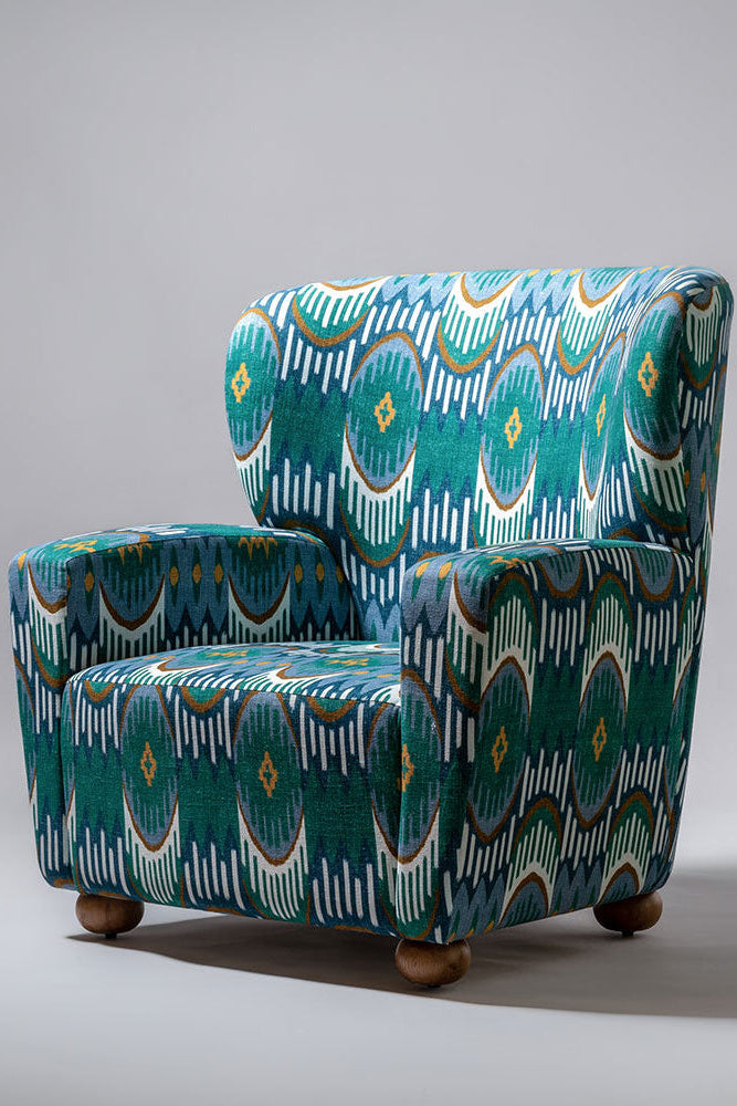 Patterned armchair on a gray background