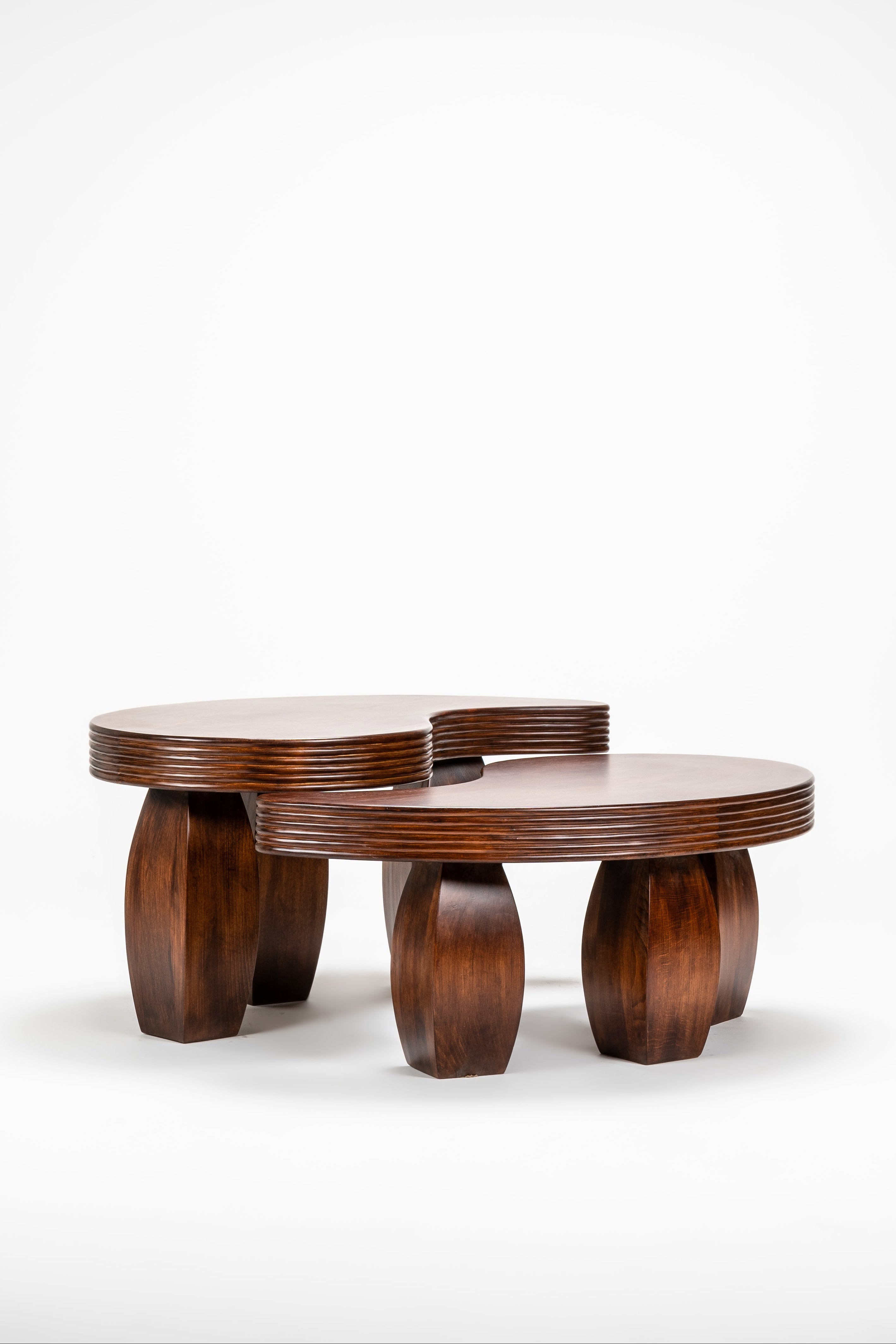 Wooden table with a unique design on a white background