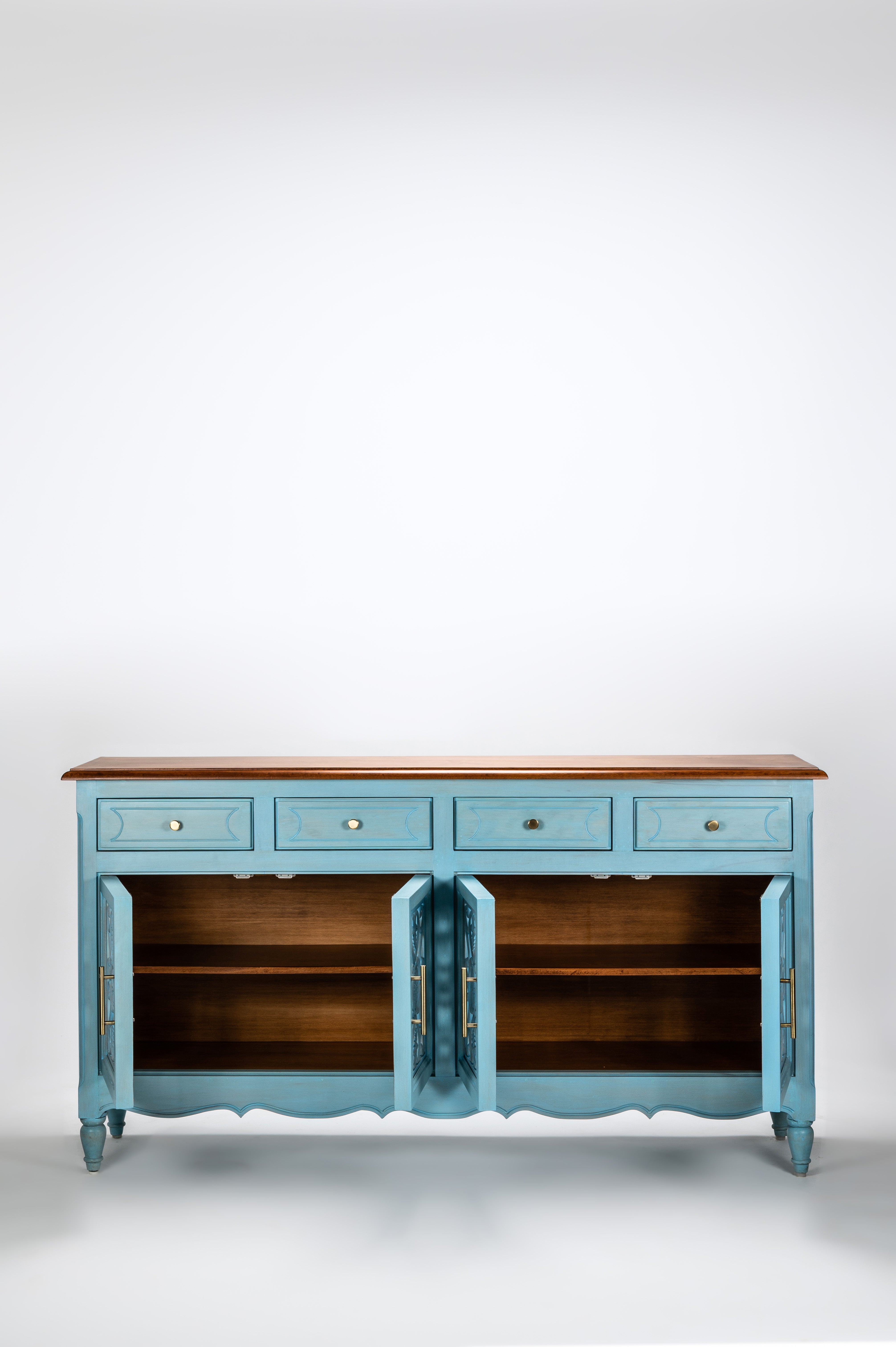 Blue wooden sideboard with a white background