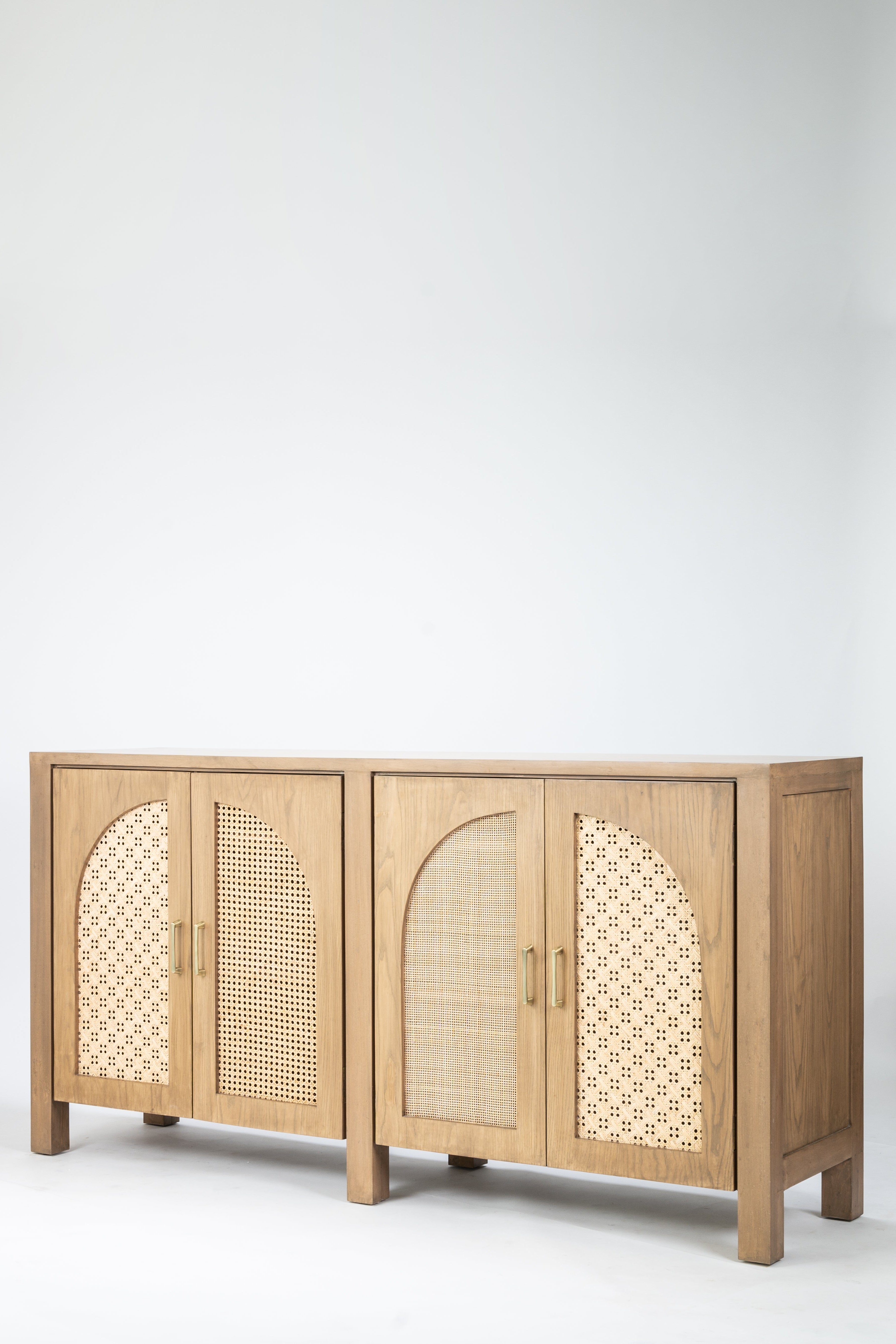 Wooden cabinet with decorative doors on a white background