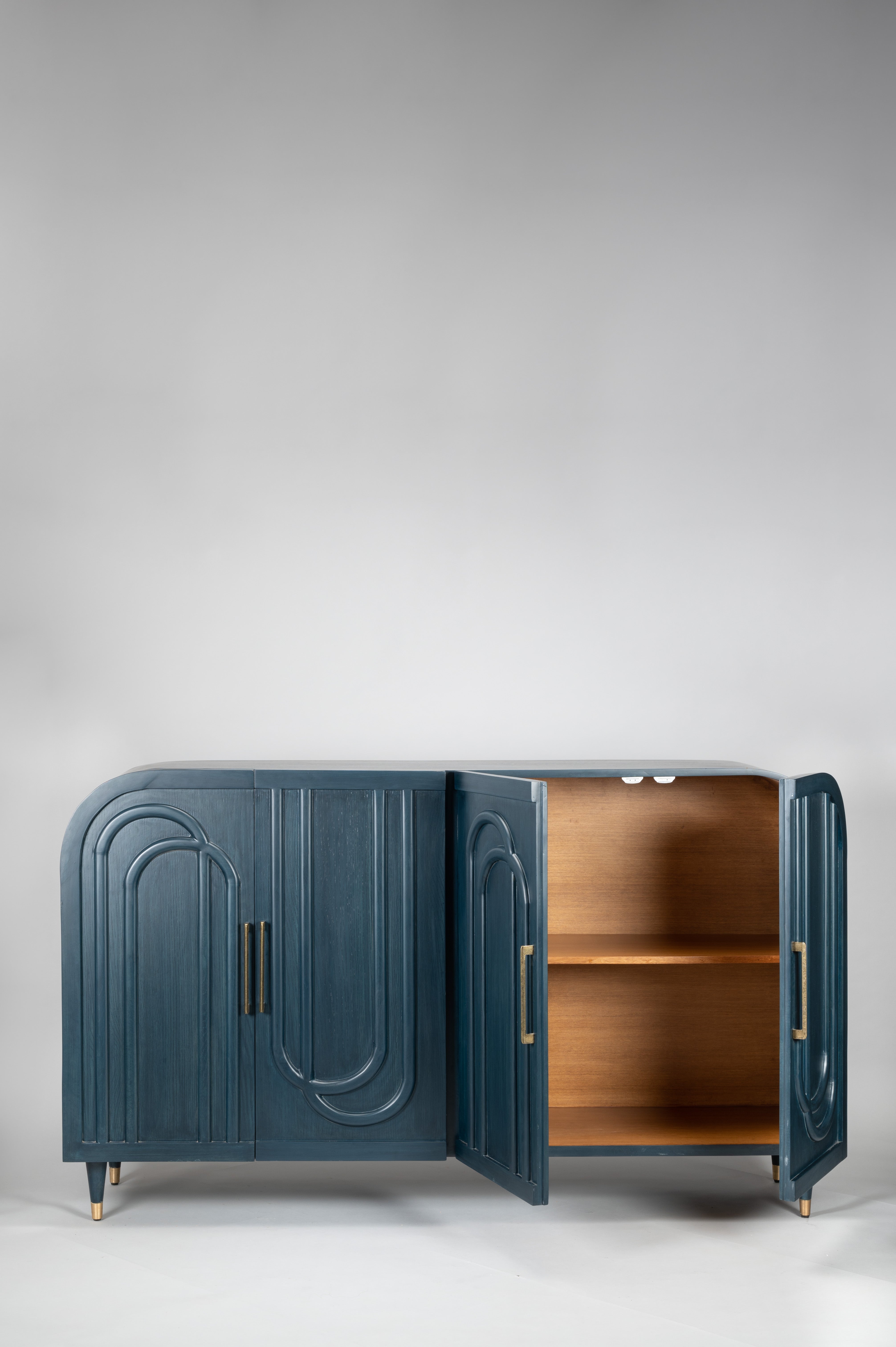 Blue cabinet with open doors on a gray background
