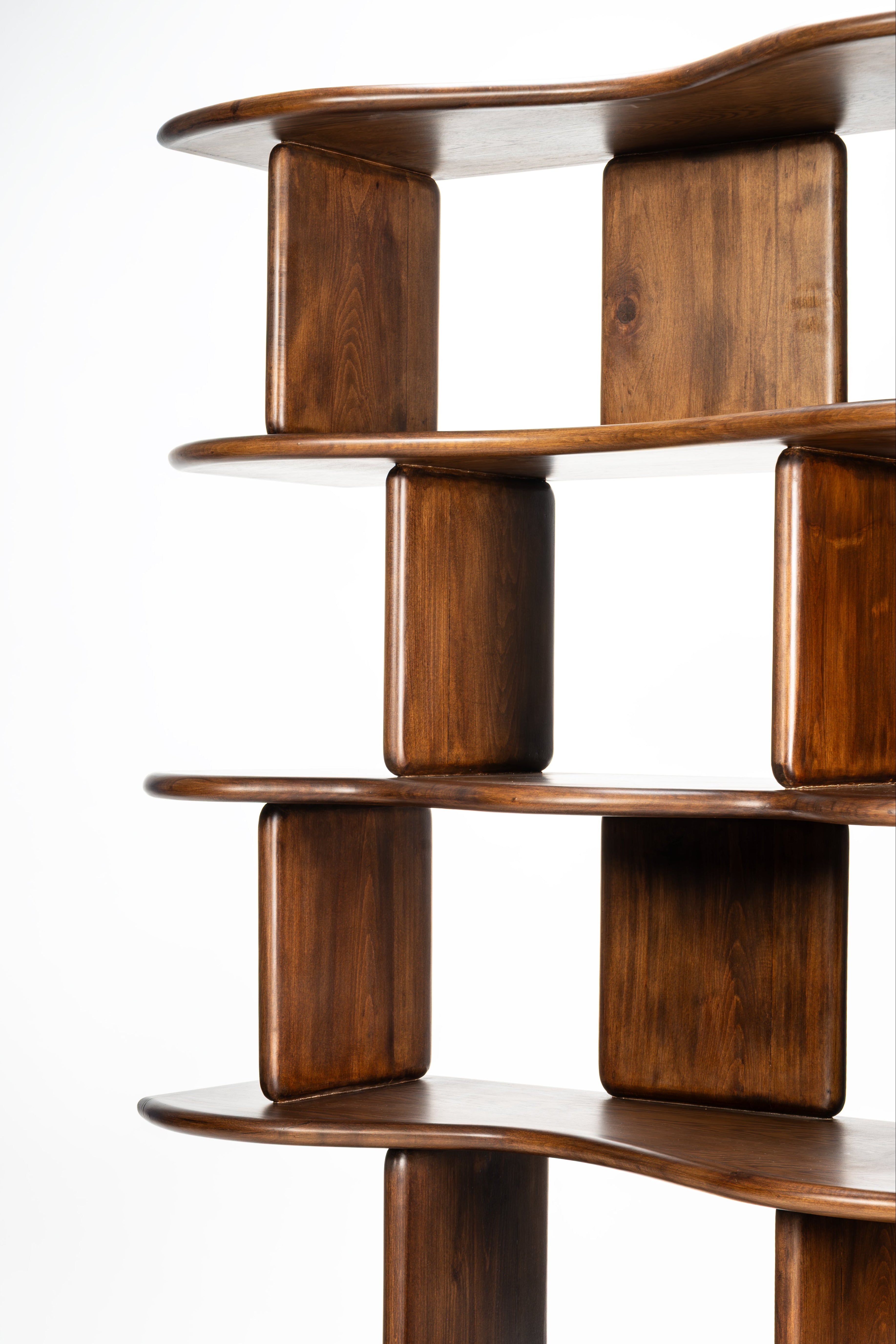 Wooden bookshelf with a modern design on a white background