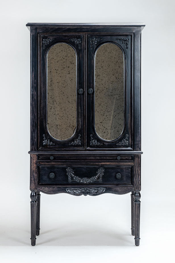 Vintage black cabinet with glass doors on a white background