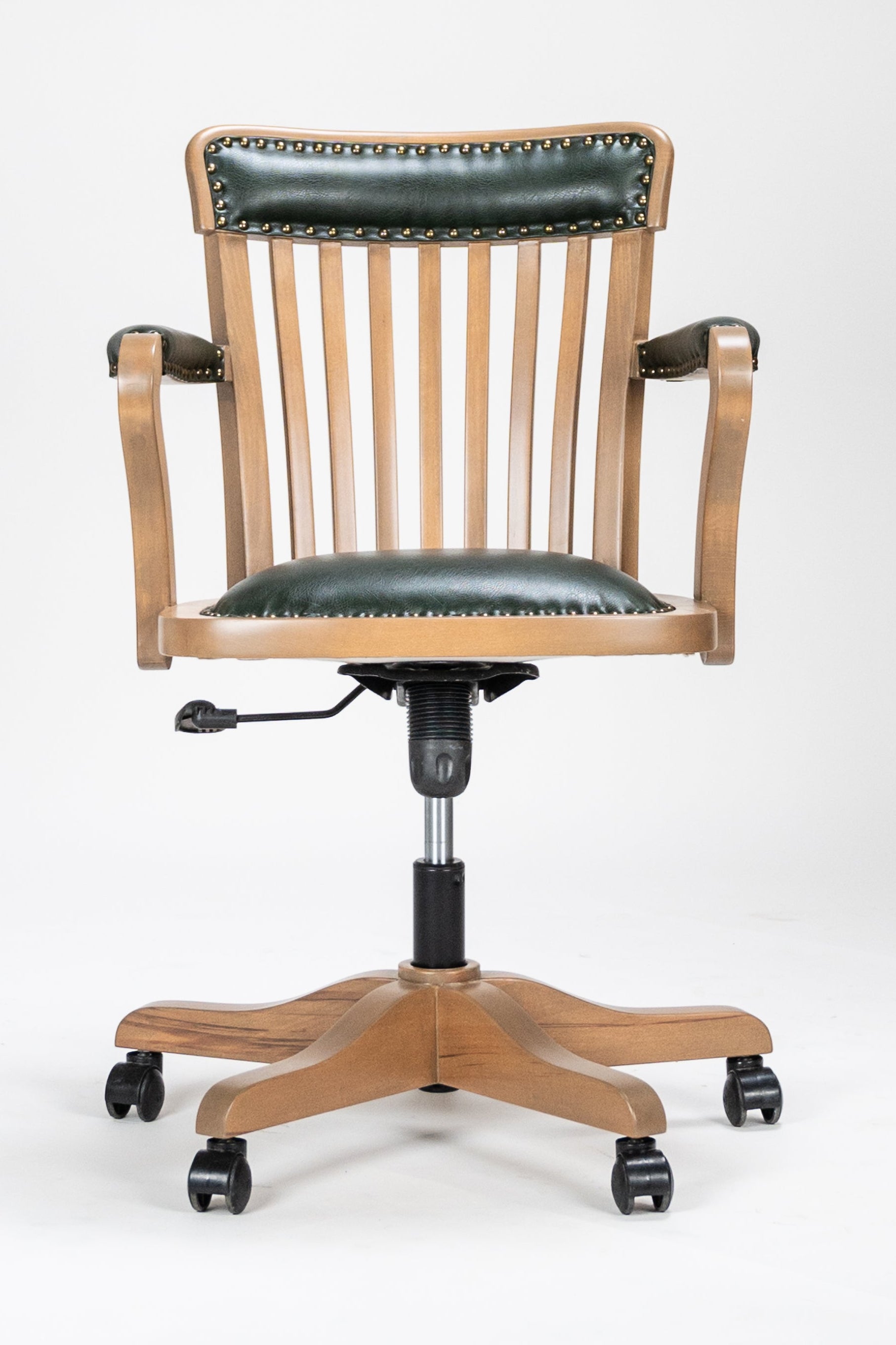 Wooden office chair with black leather seat and backrest on a white background
