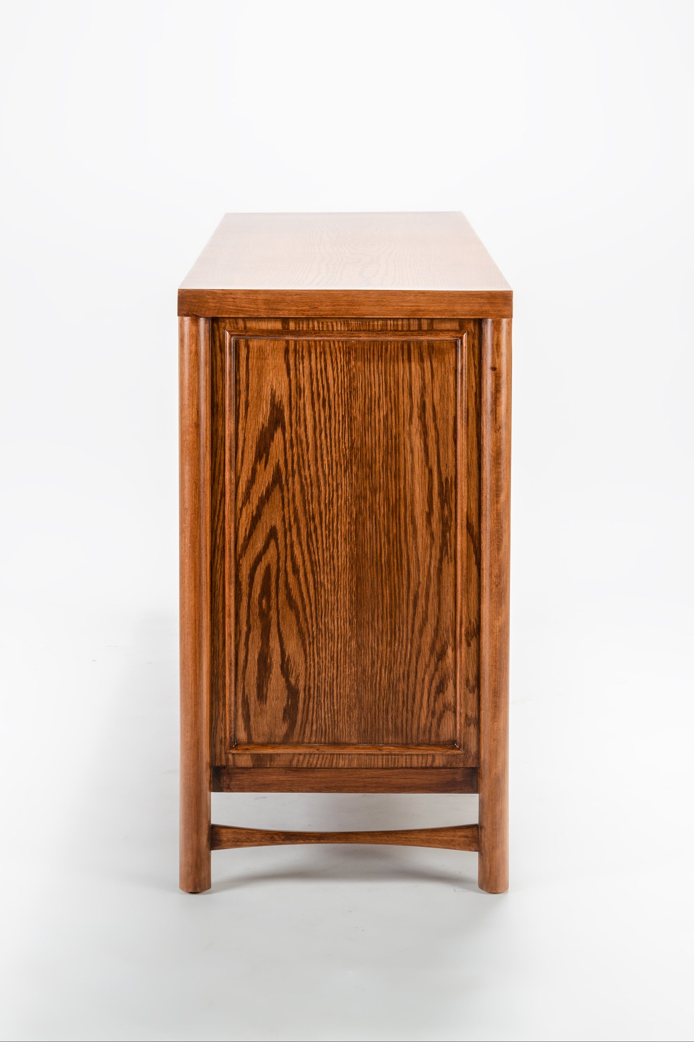 Wooden cabinet with a white top on a white background