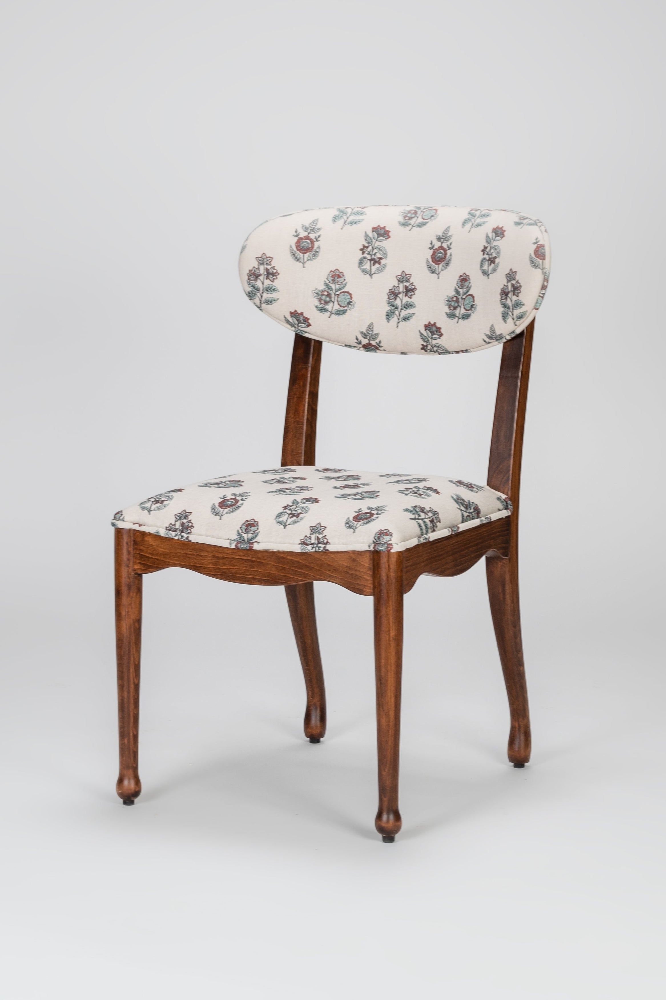 Chair with patterned seat and backrest on a gray background