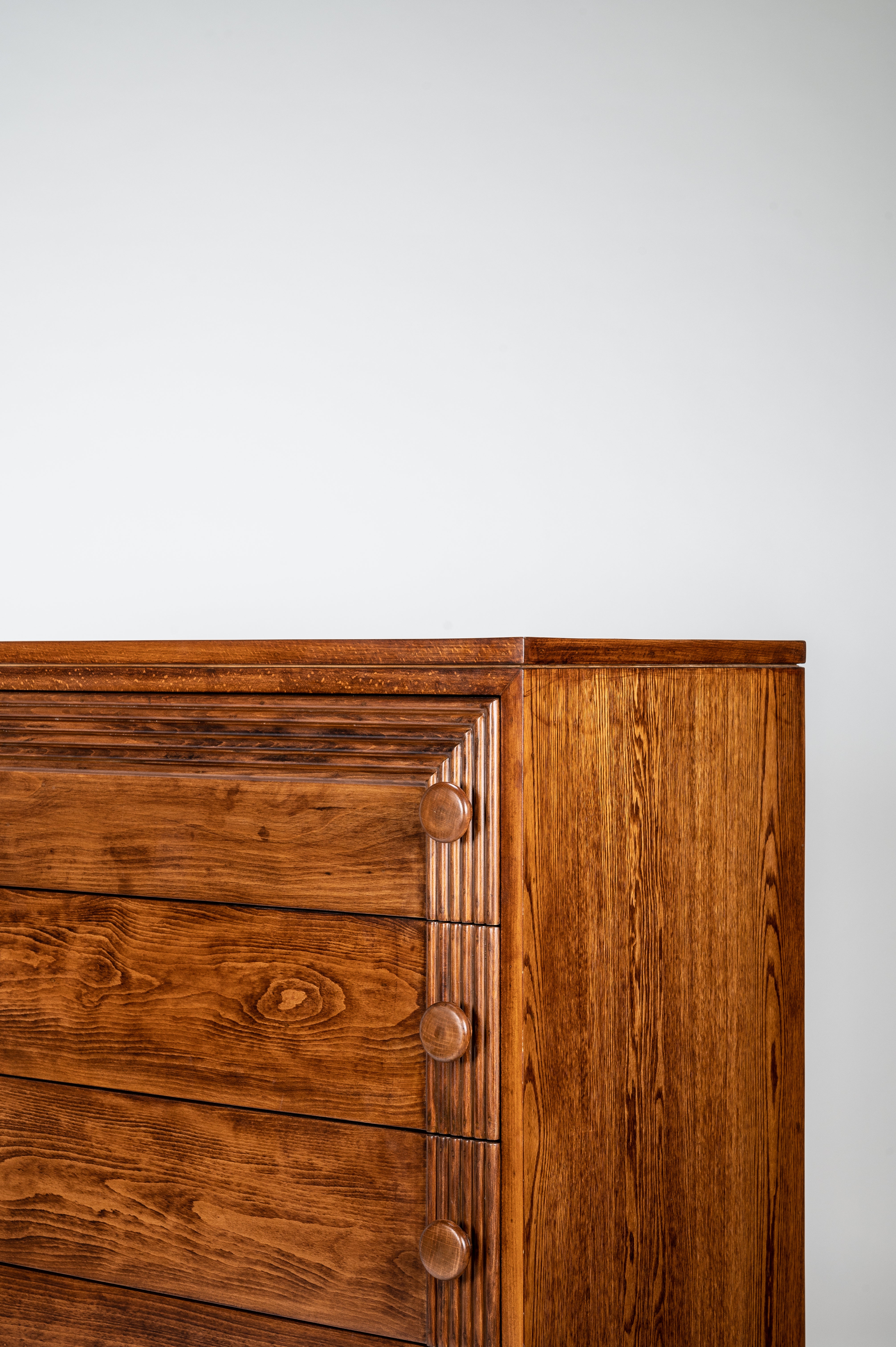Wooden dresser with a white background