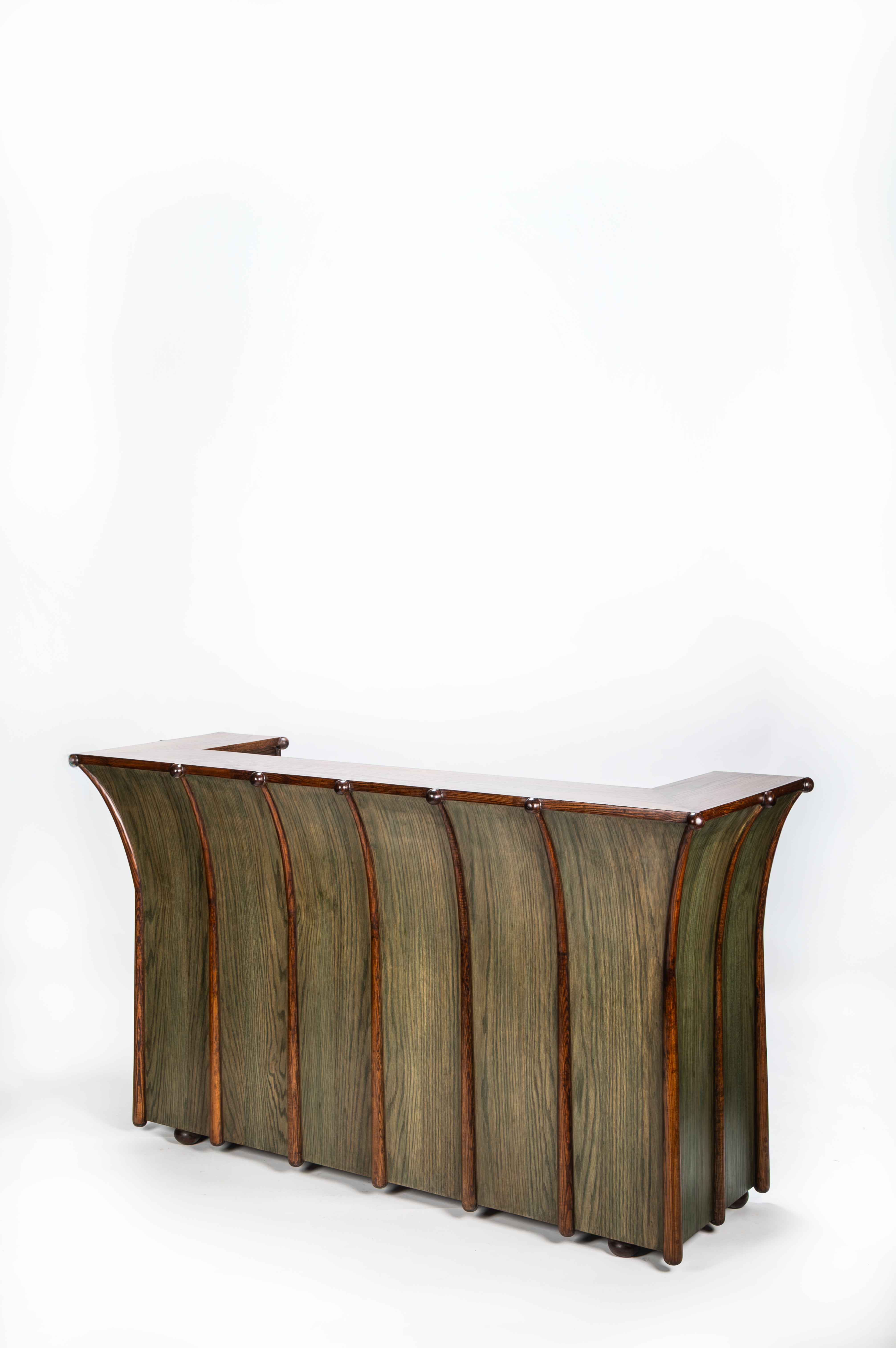 Modern bar counter with a curved design on a white background