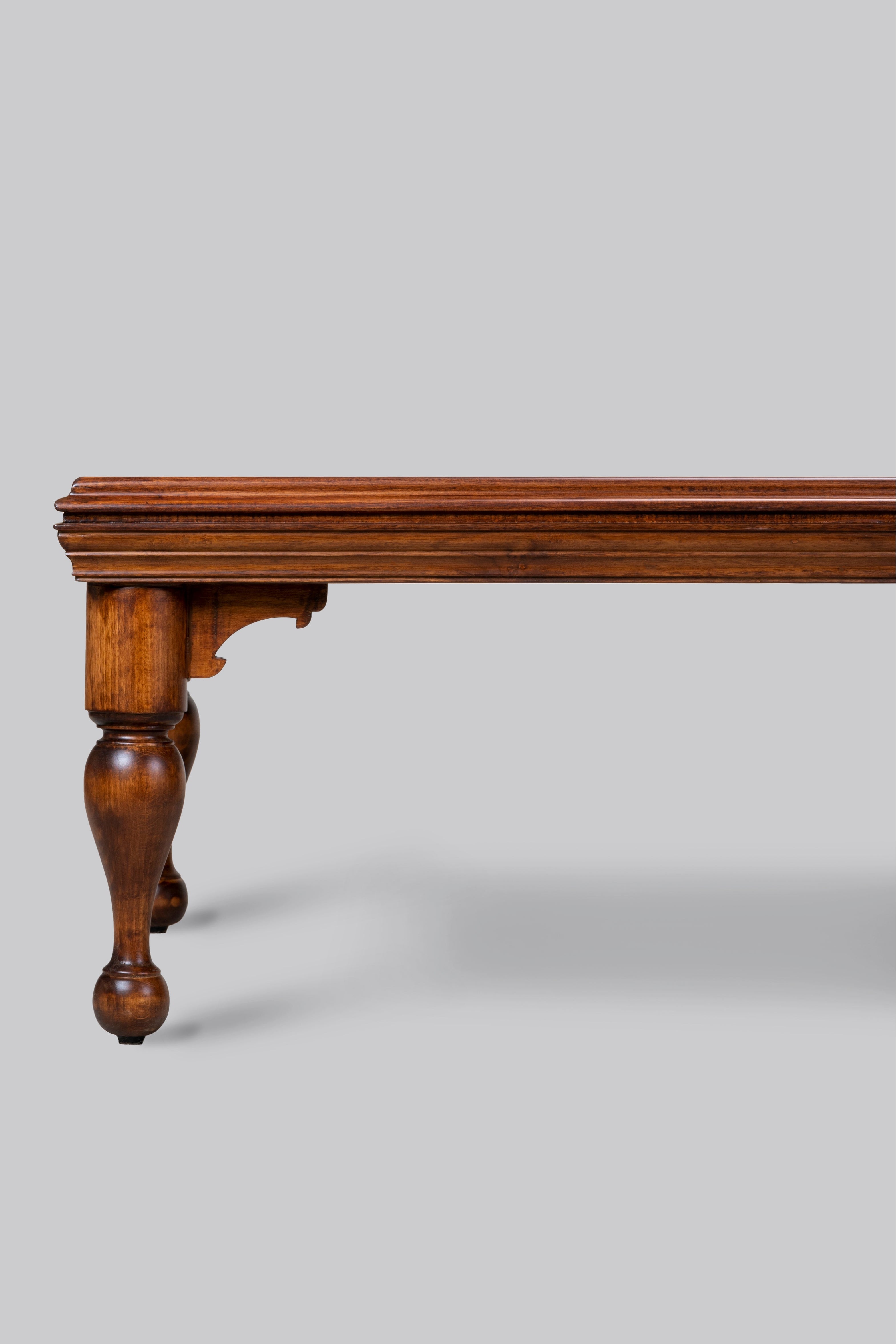 Wooden table leg on a gray background