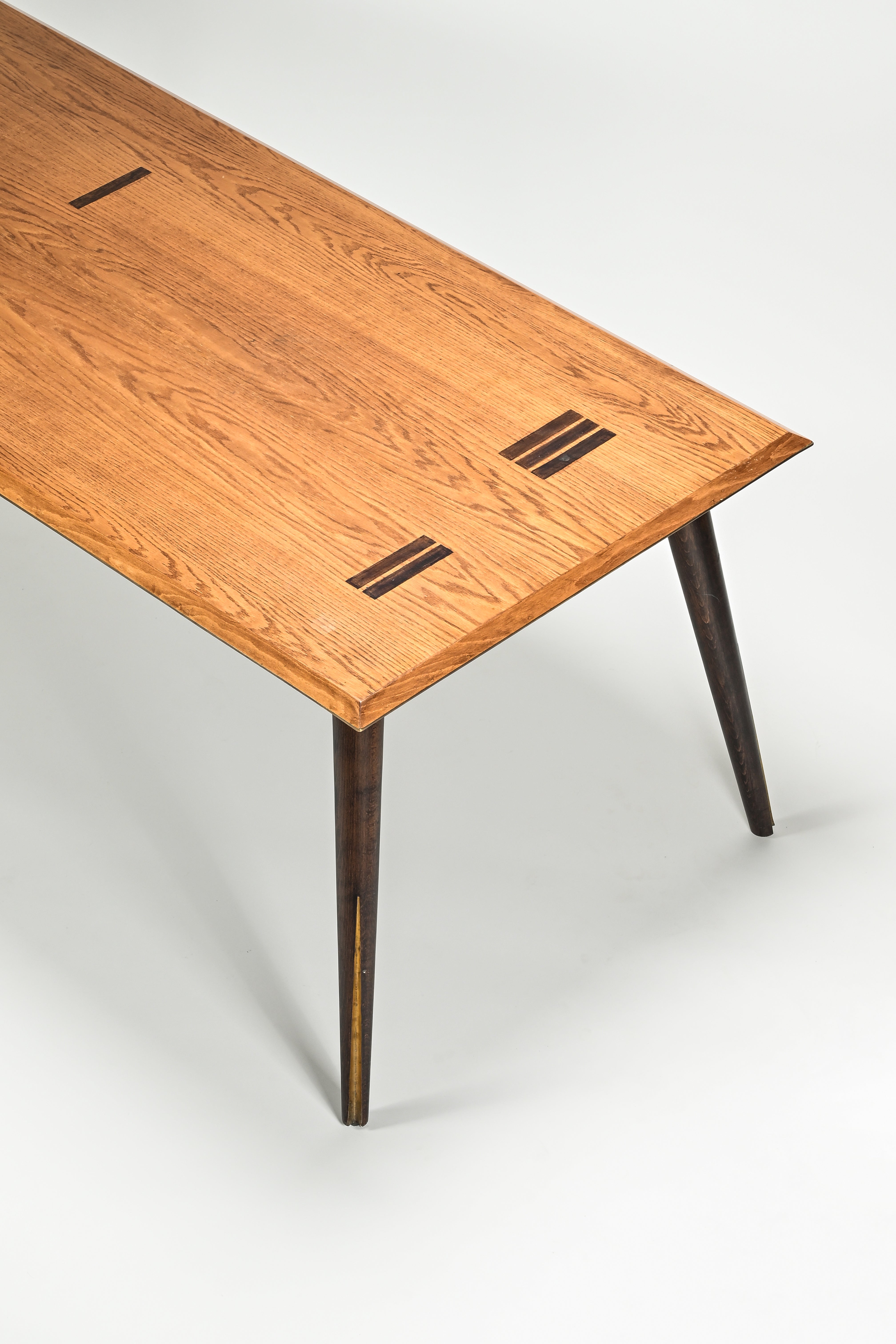 Wooden table with a minimalist design on a white background