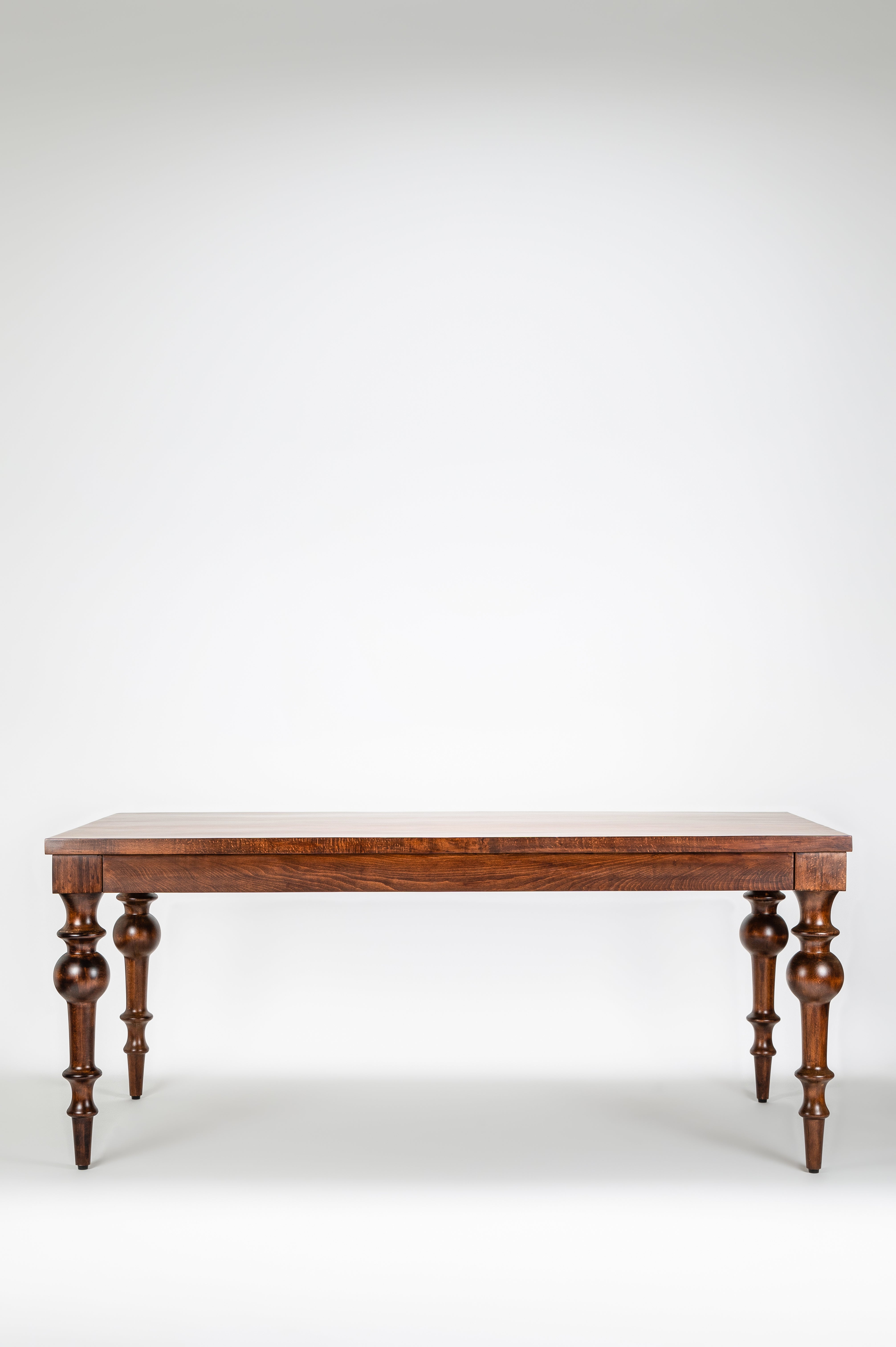 Wooden table with a white background