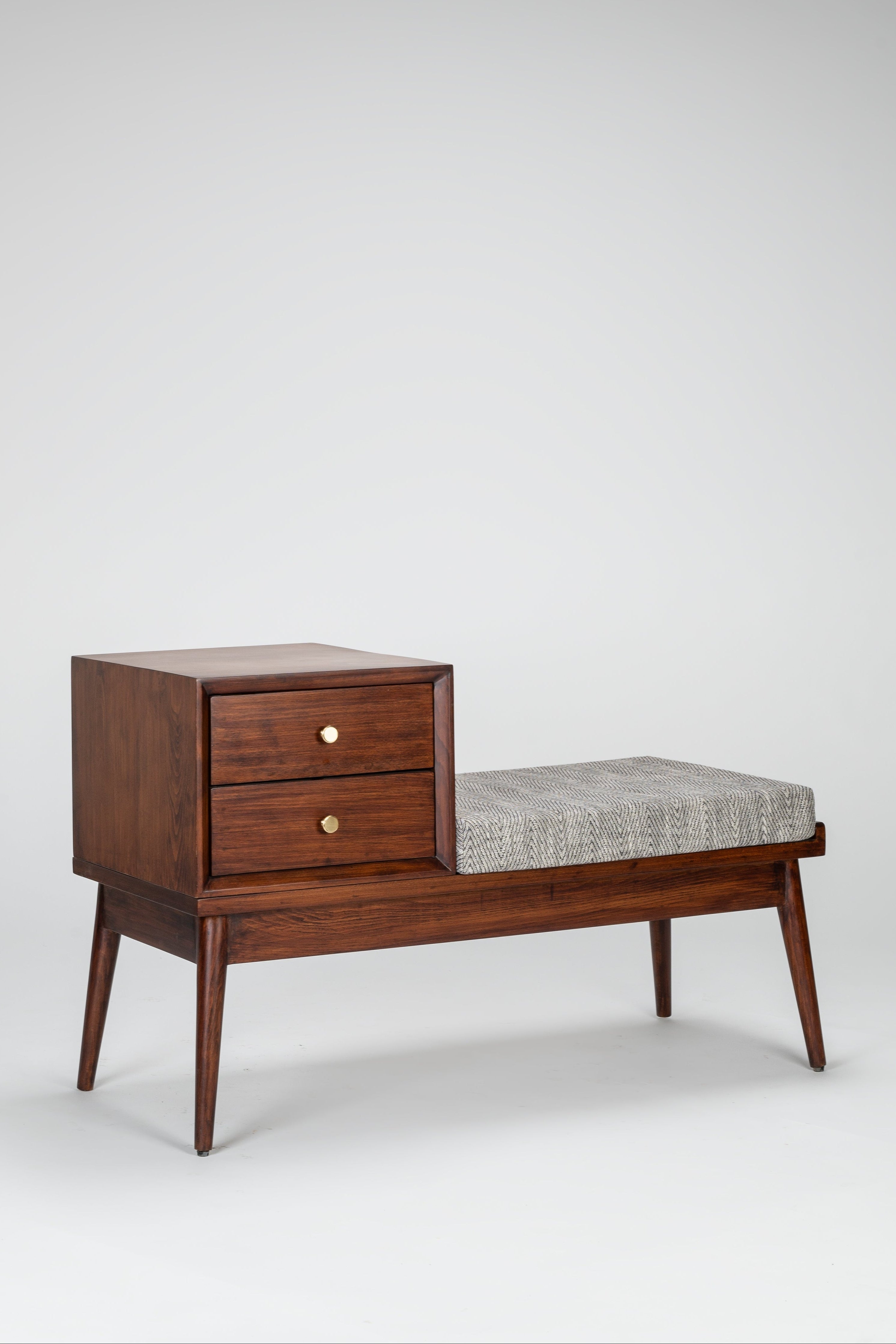 Wooden bench with cushioned seat on a white background