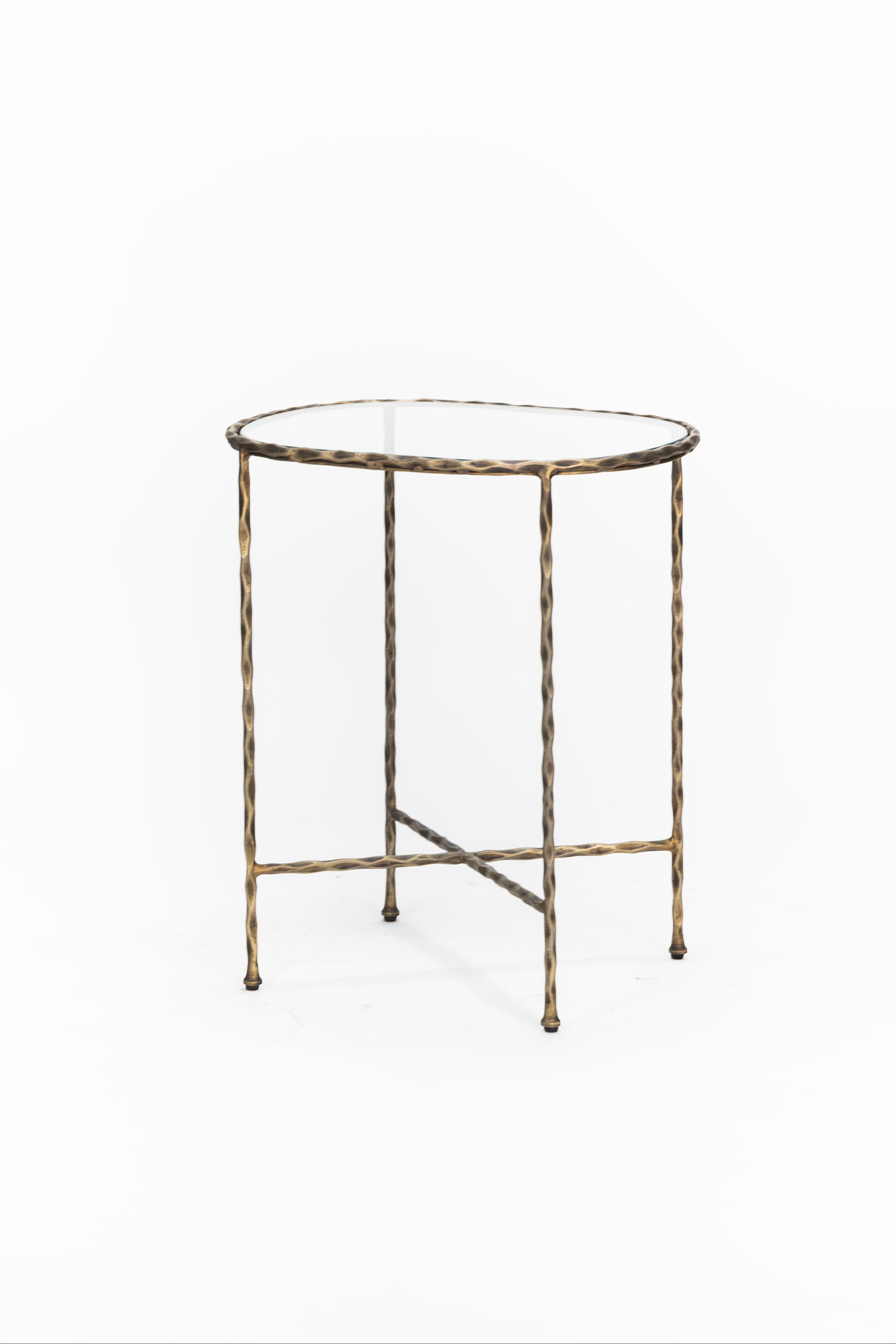 Small round table with a gold metal frame on a white background