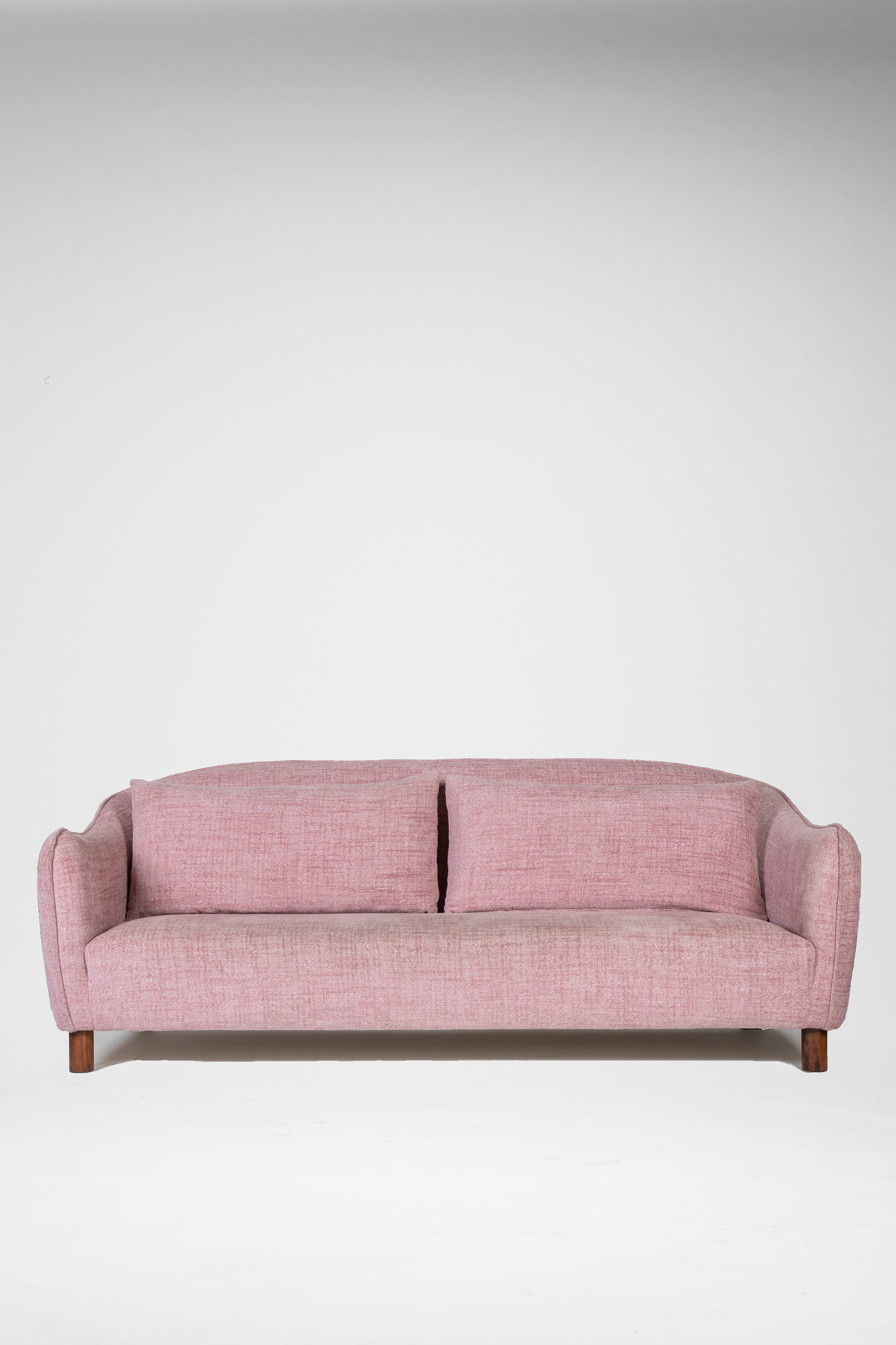 Pink sofa on a white background
