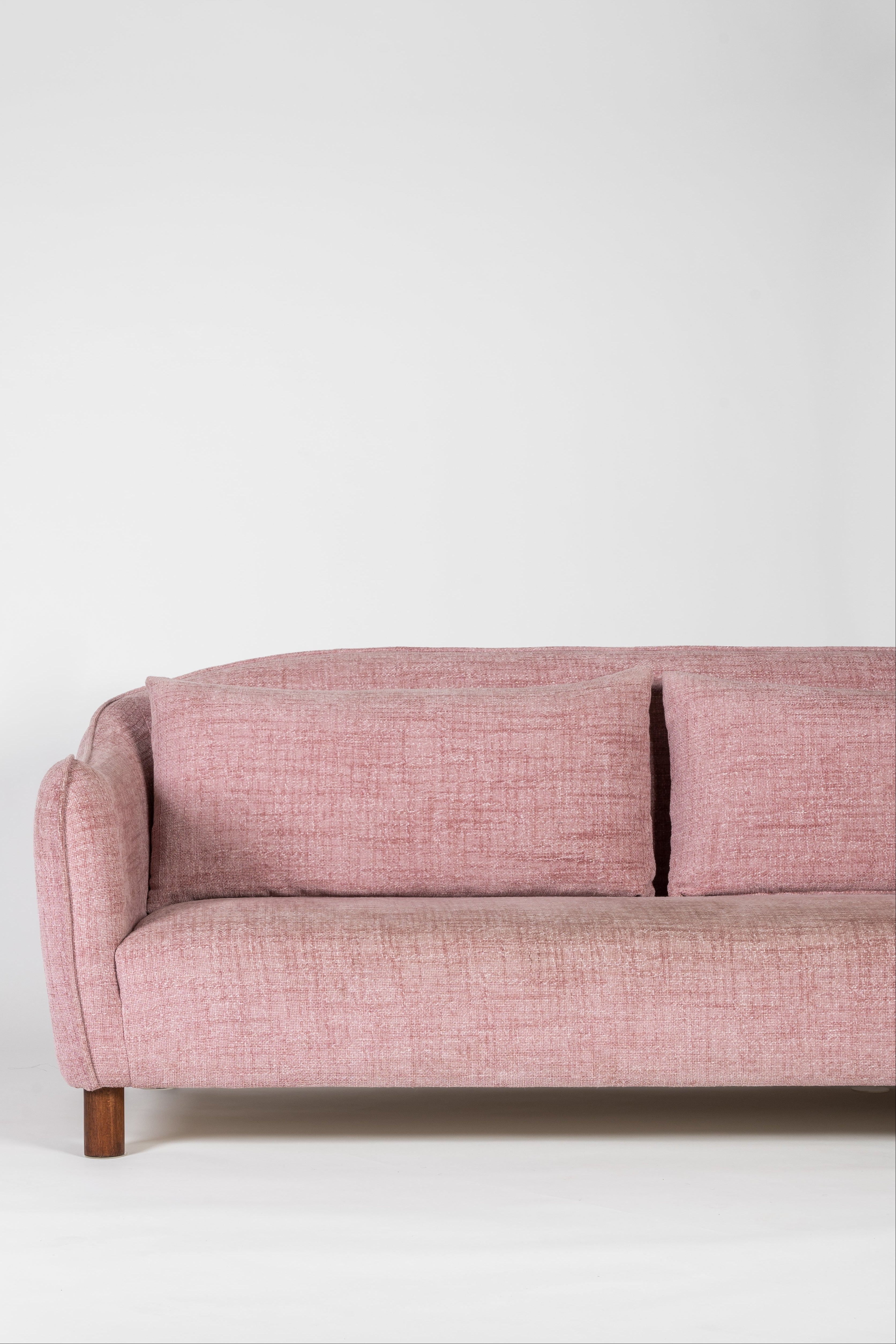 Pink sofa on a white background