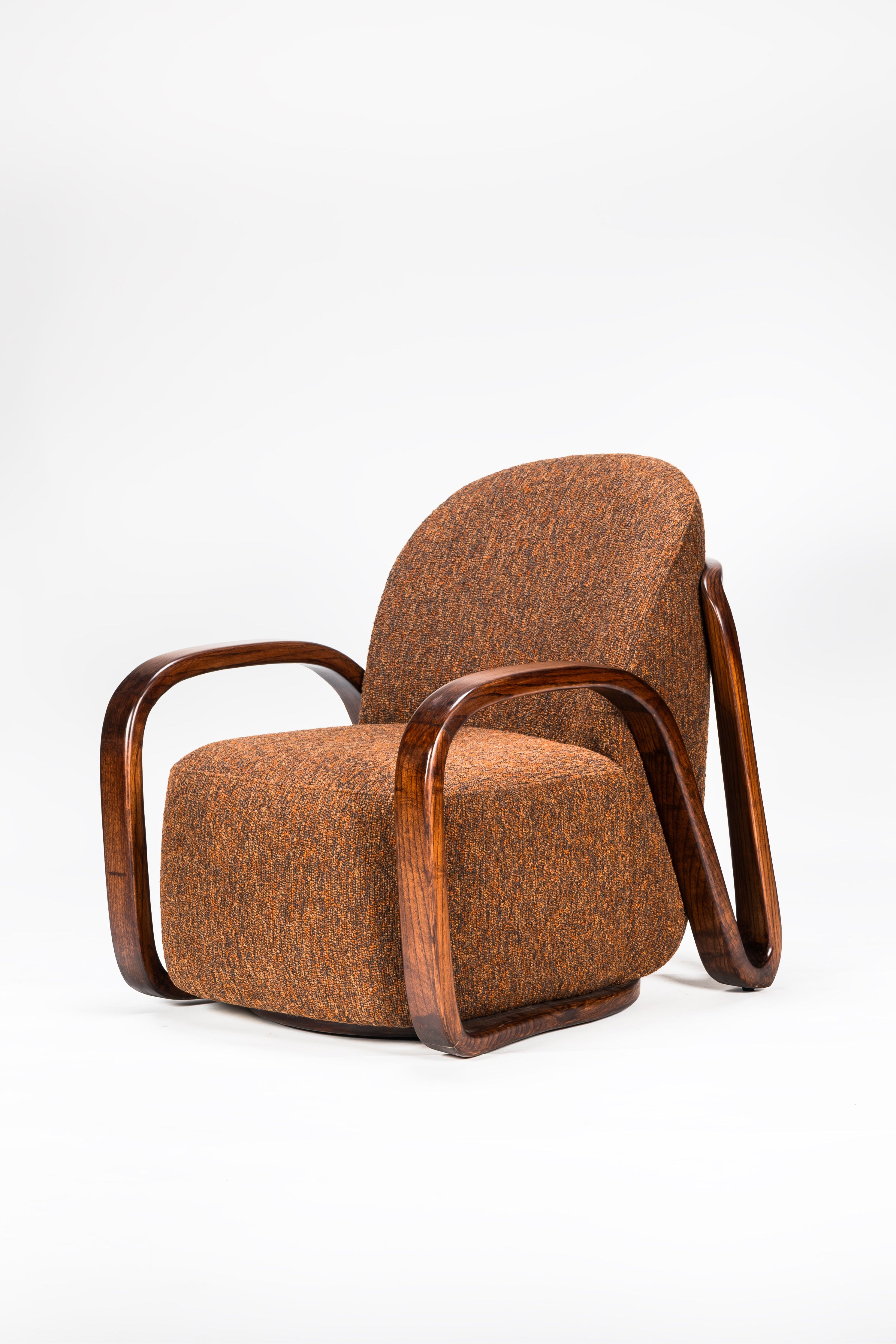 Brown armchair with wooden armrests on a white background