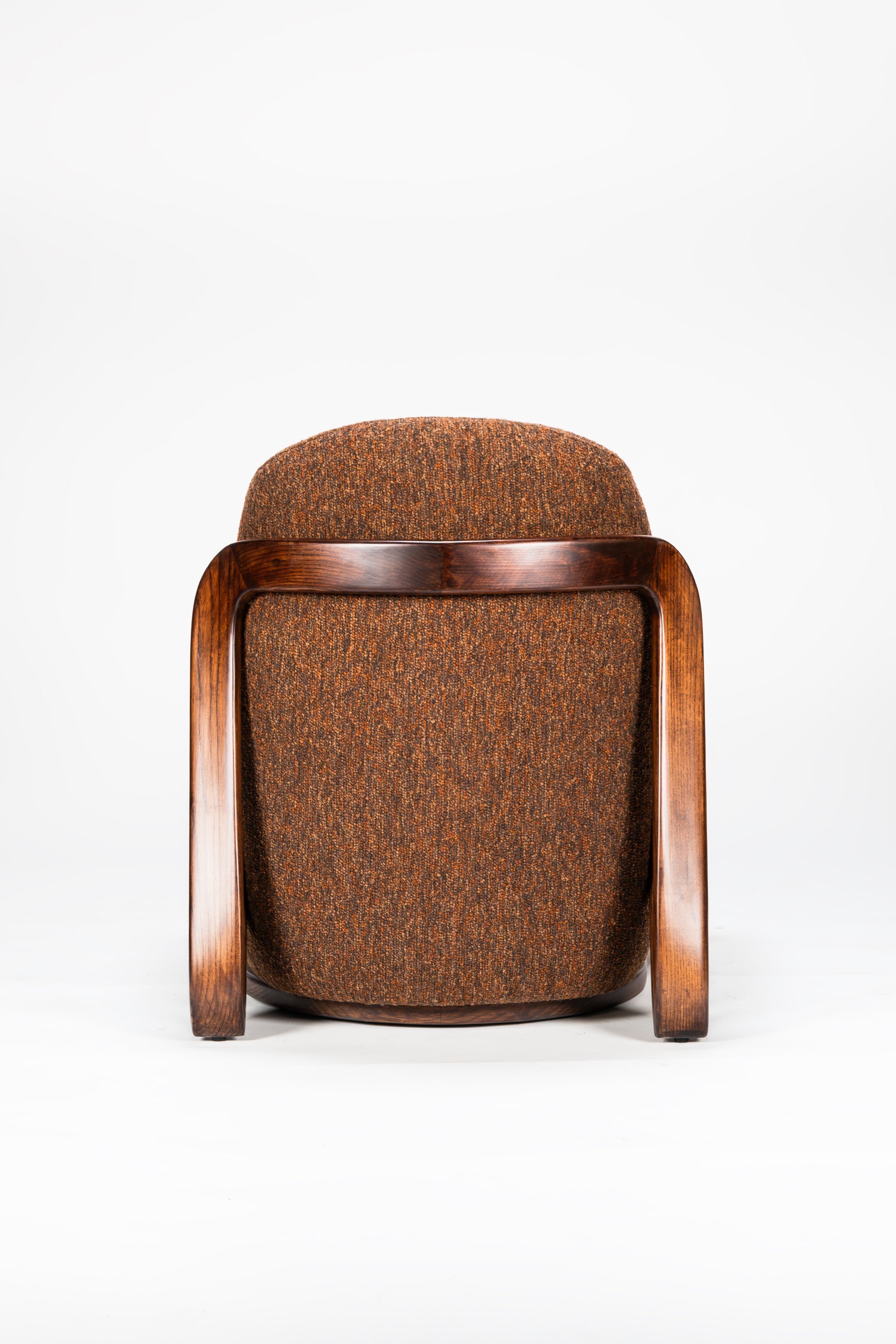 Brown upholstered chair with wooden frame on a white background