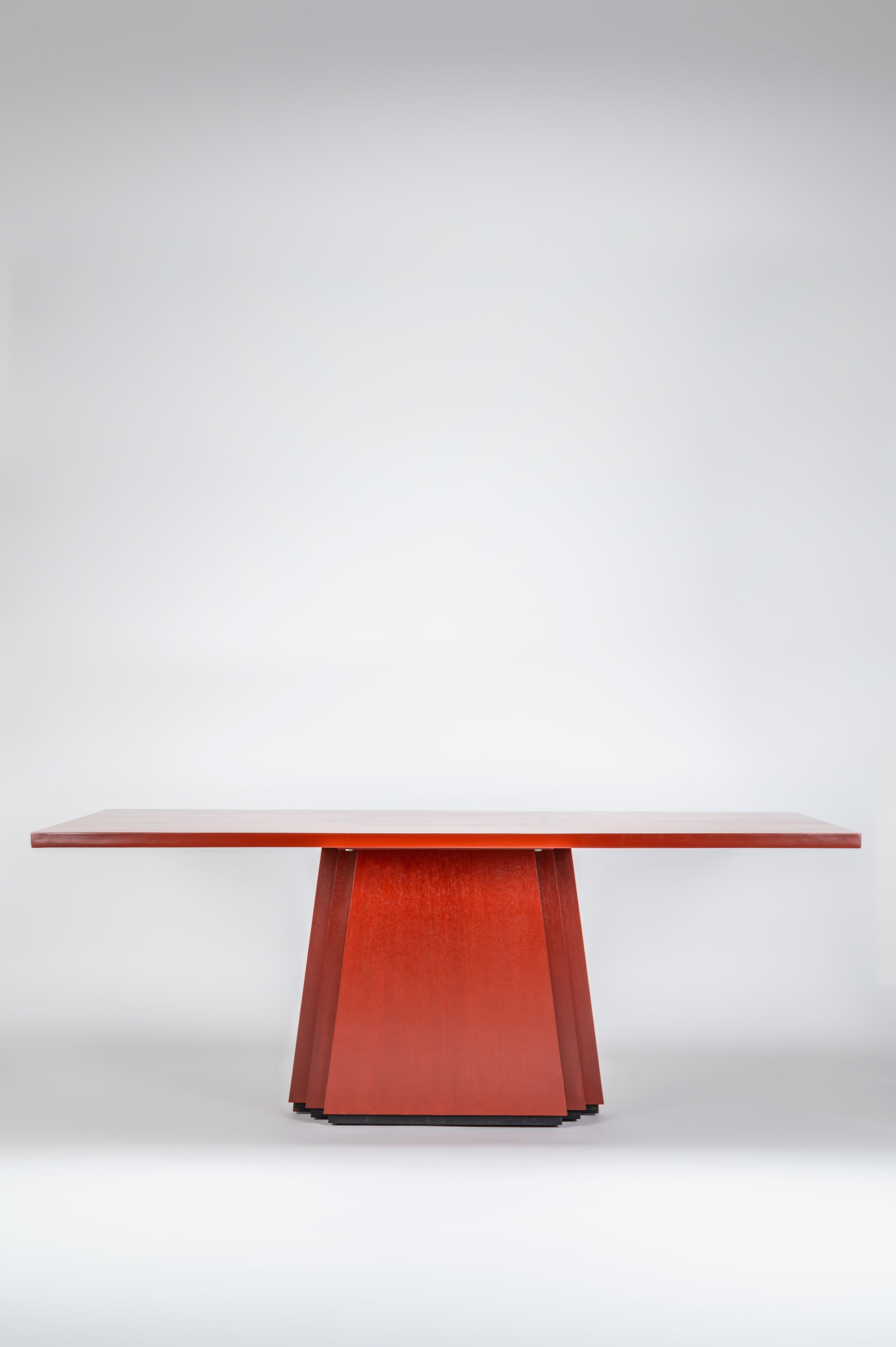 Red dining table on a white background