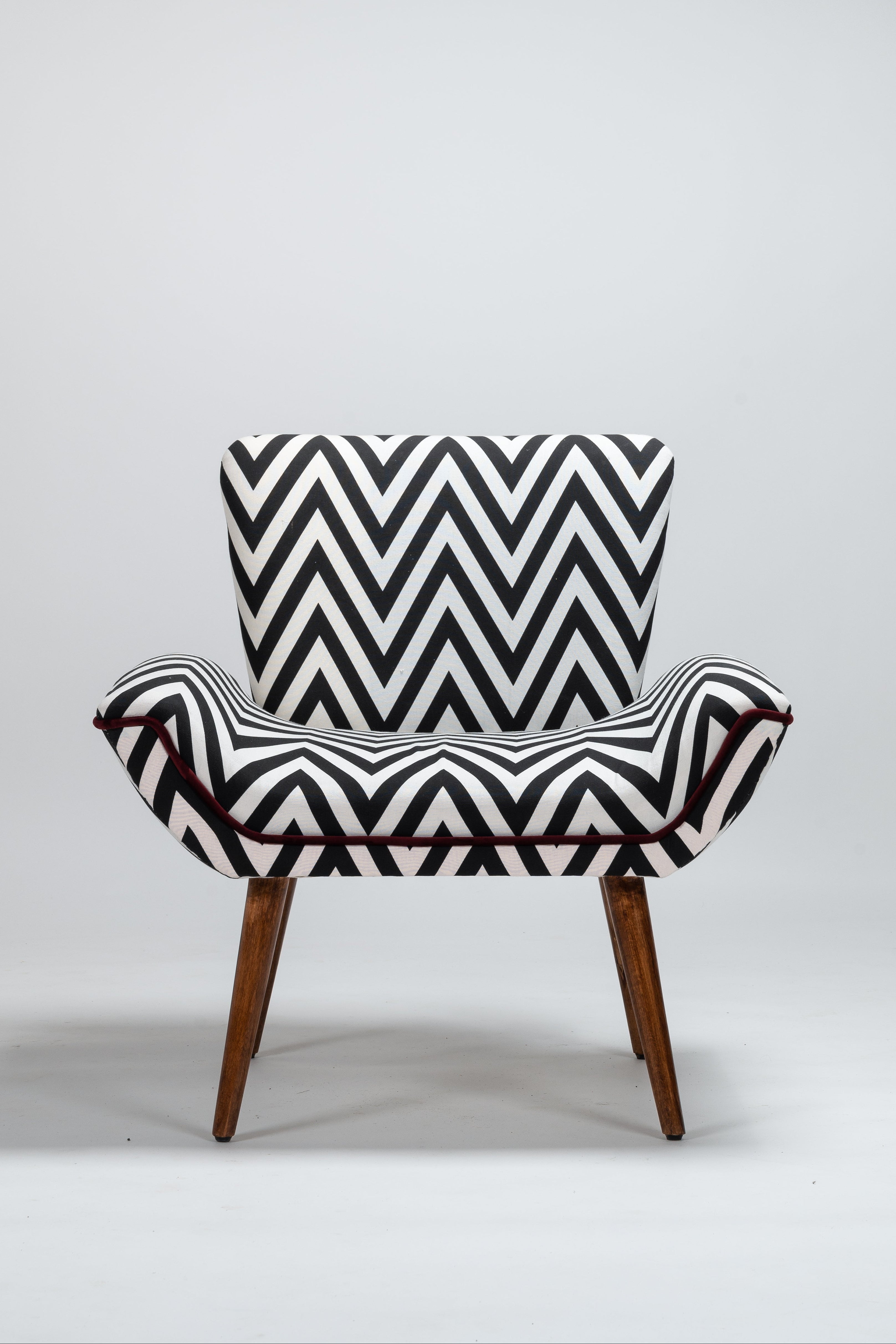 Chair with black and white zigzag pattern on a white background