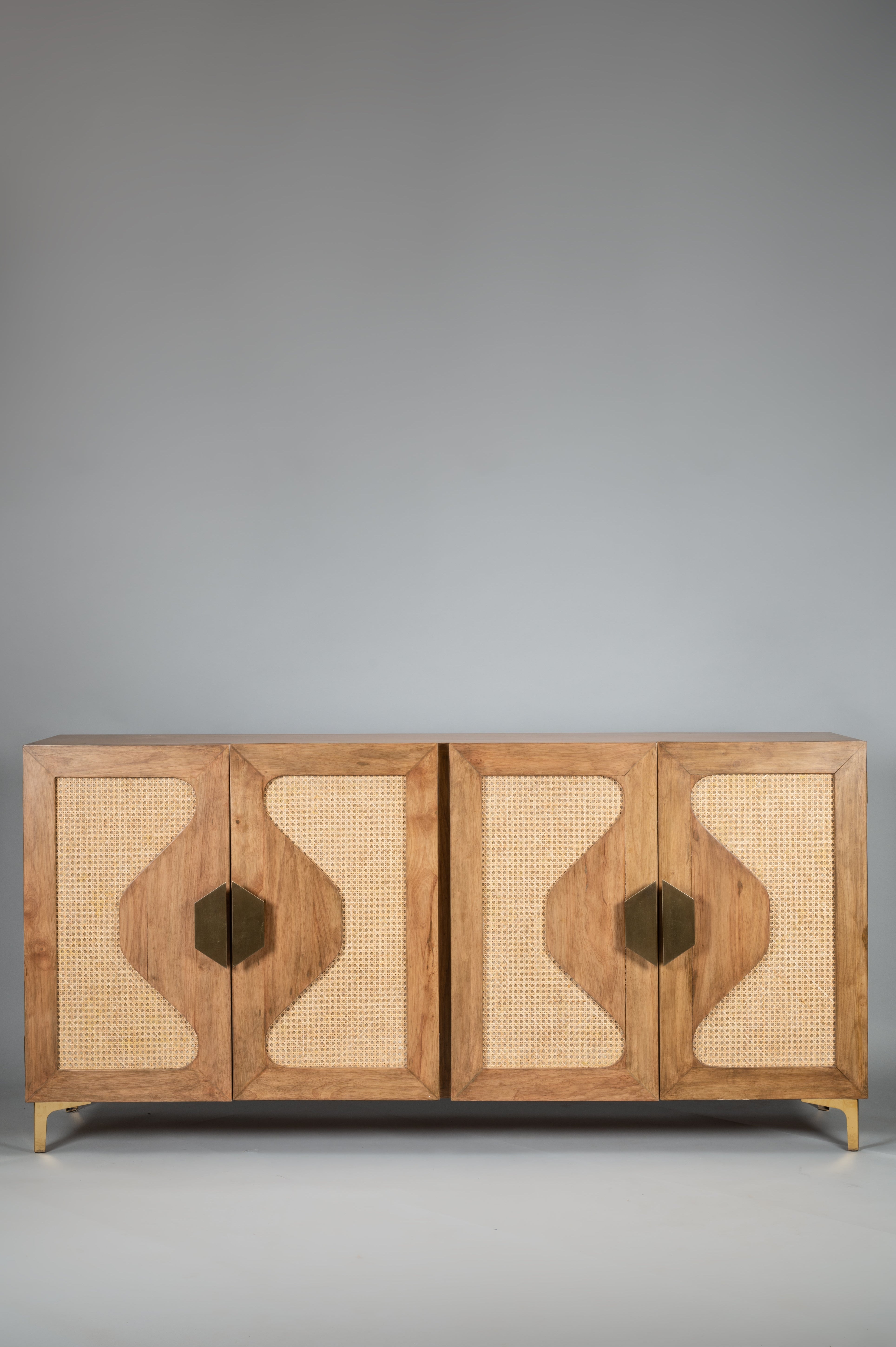 Wooden cabinet with wicker doors on a gray background