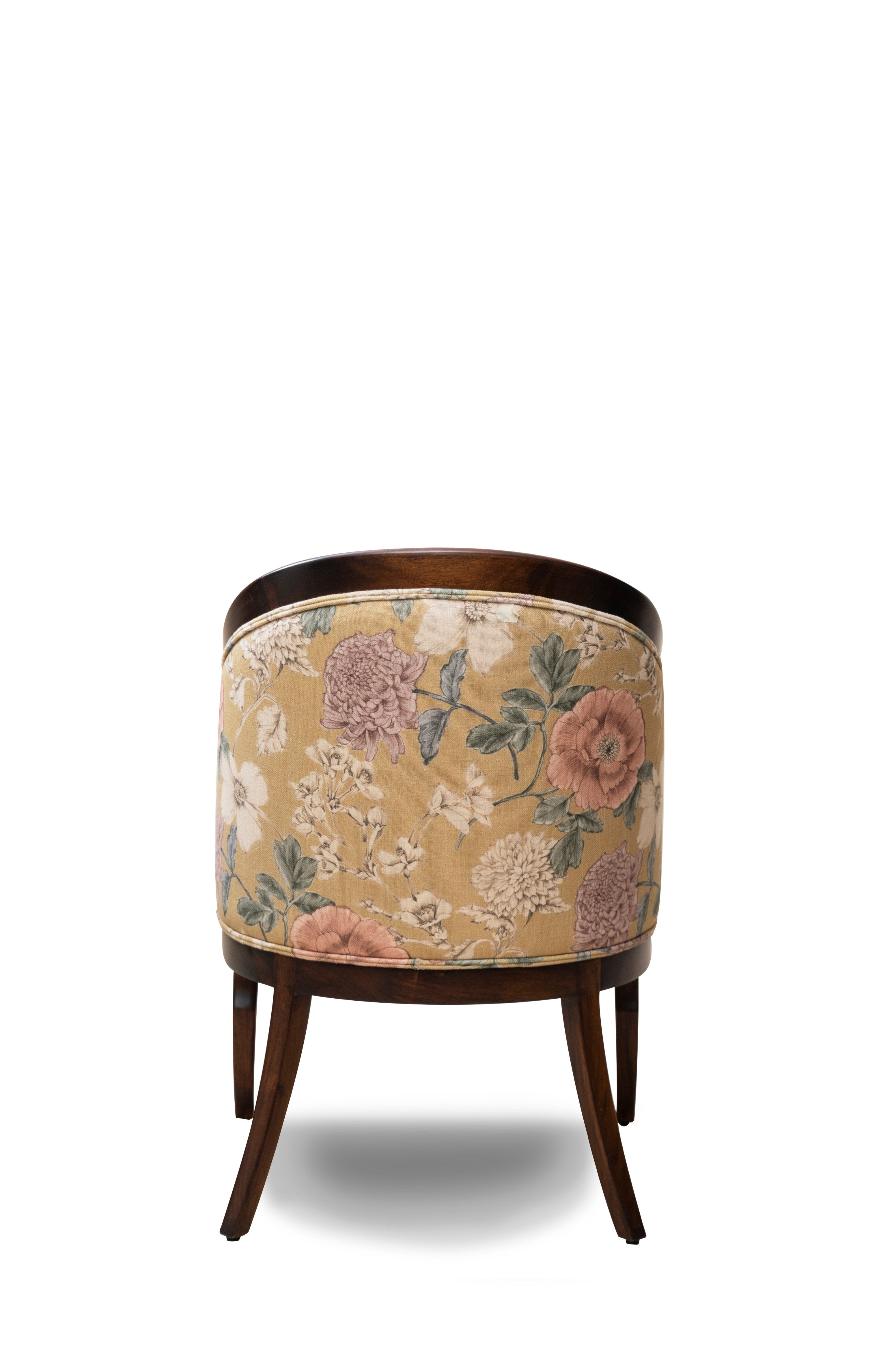 Floral-patterned chair with wooden frame on a white background