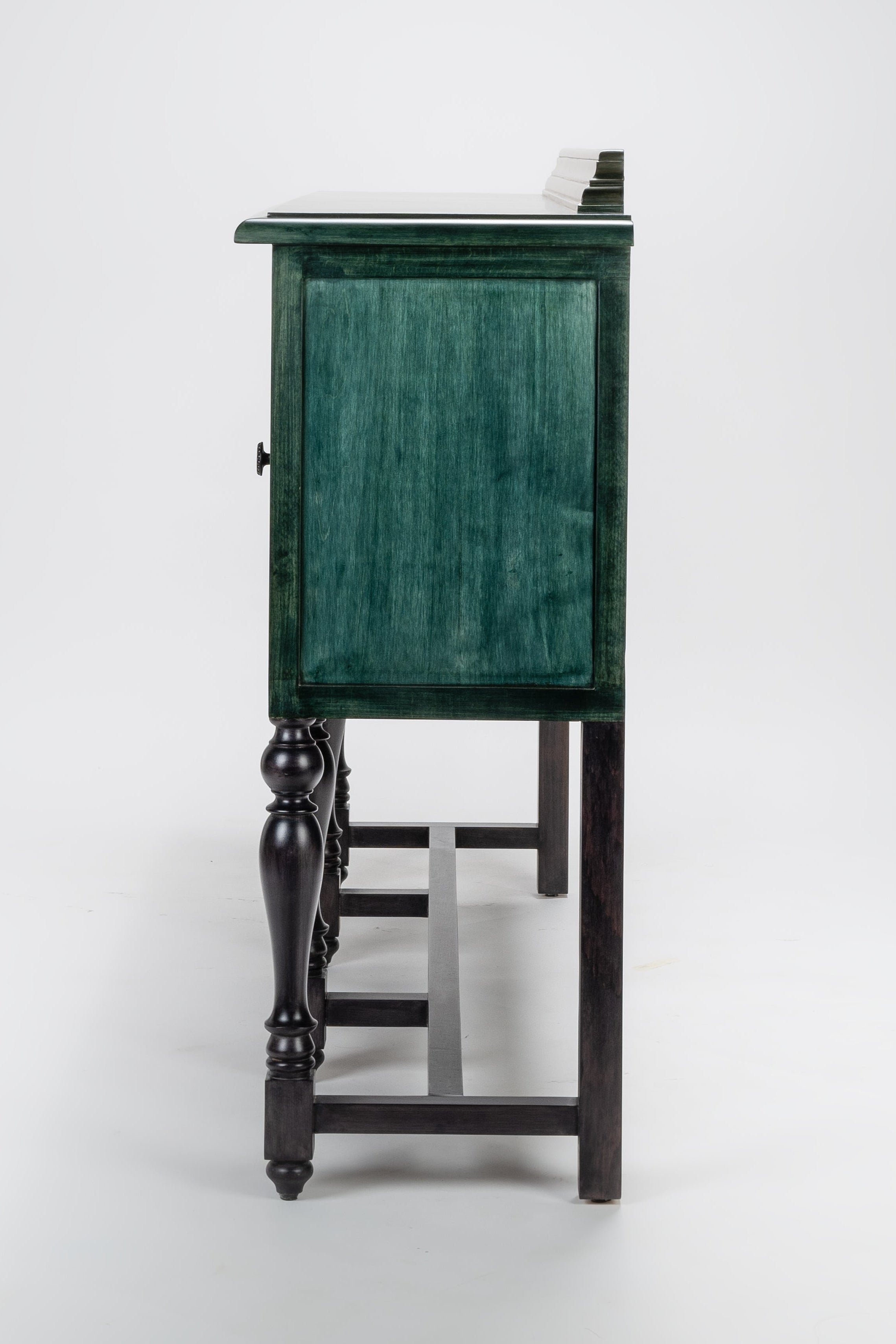 Green cabinet with black legs on a white background