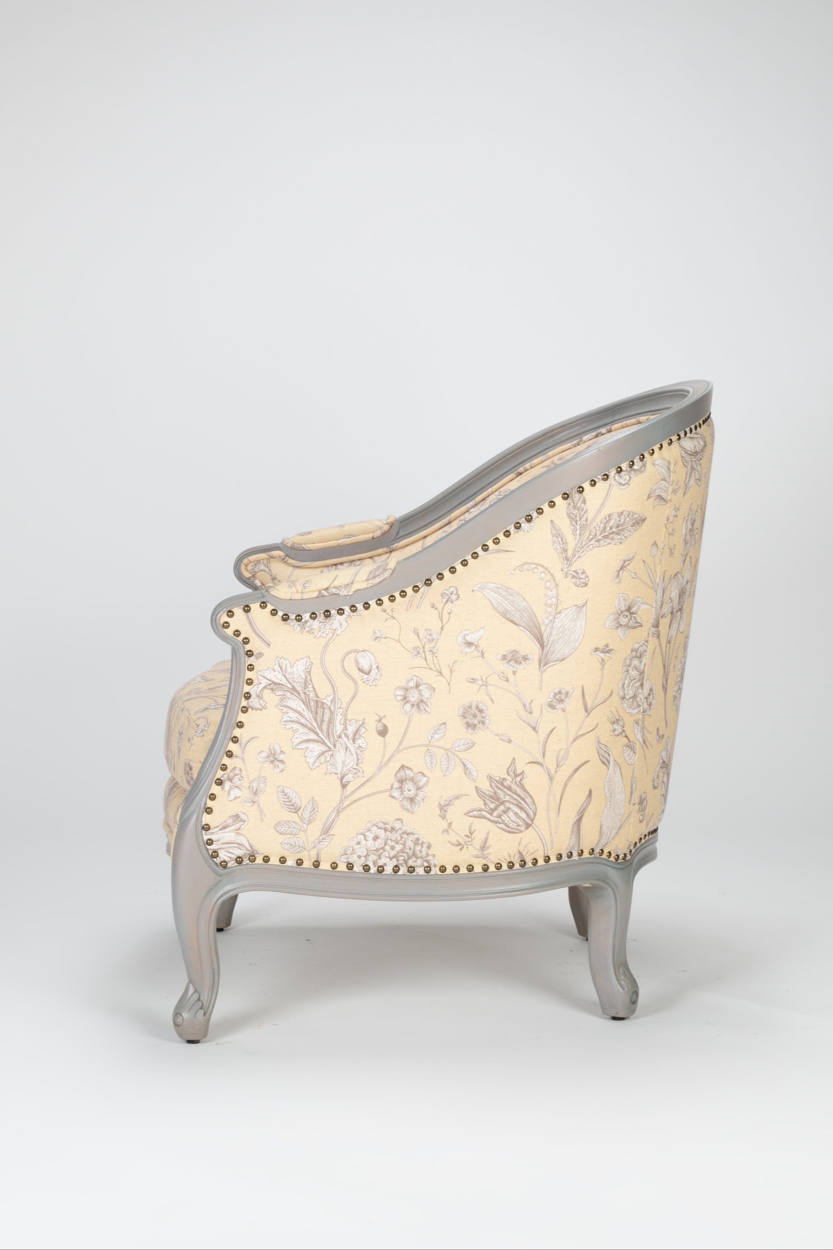Decorative armchair with floral pattern on a white background