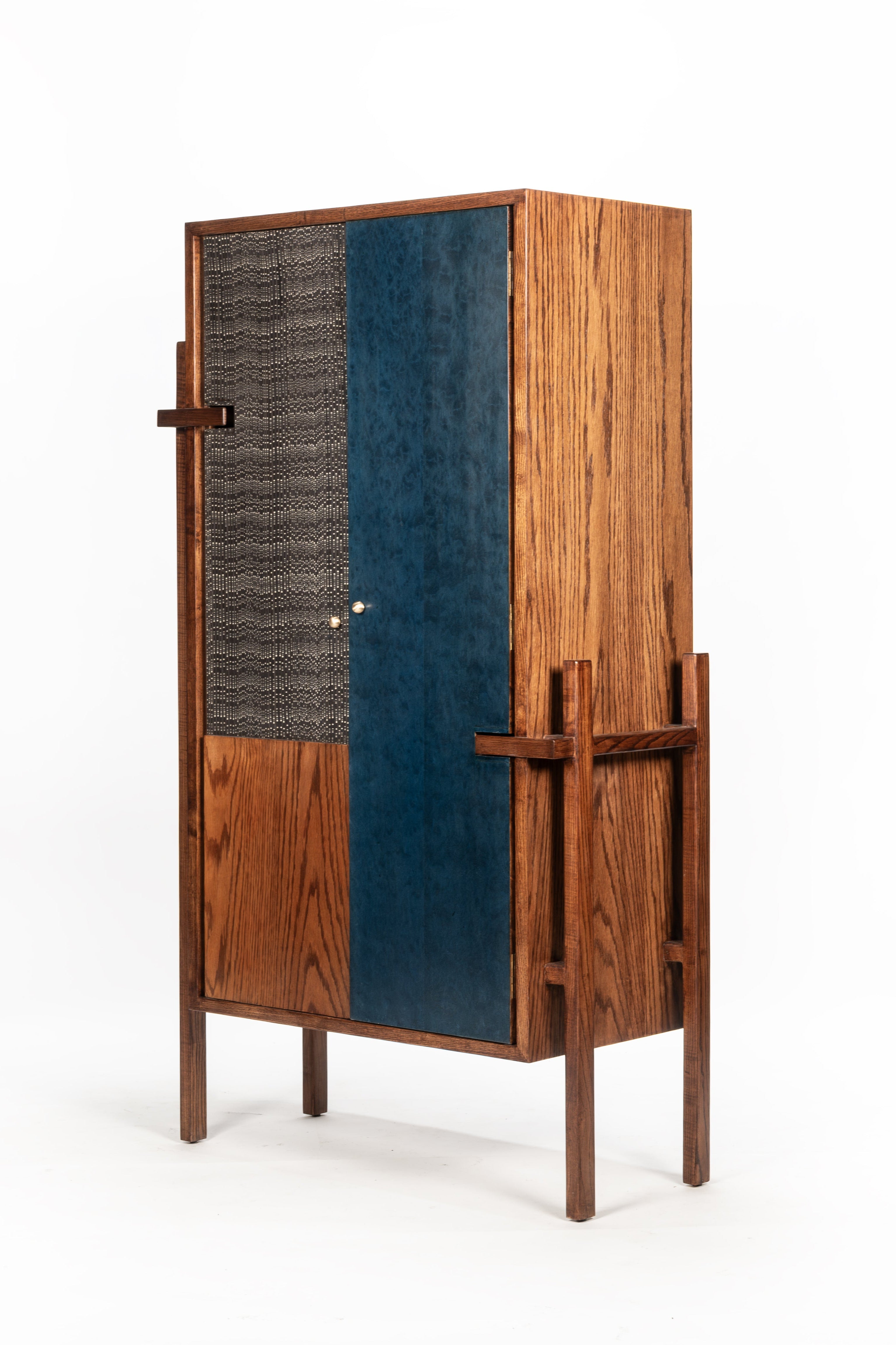 Wooden cabinet with a blue door on a white background