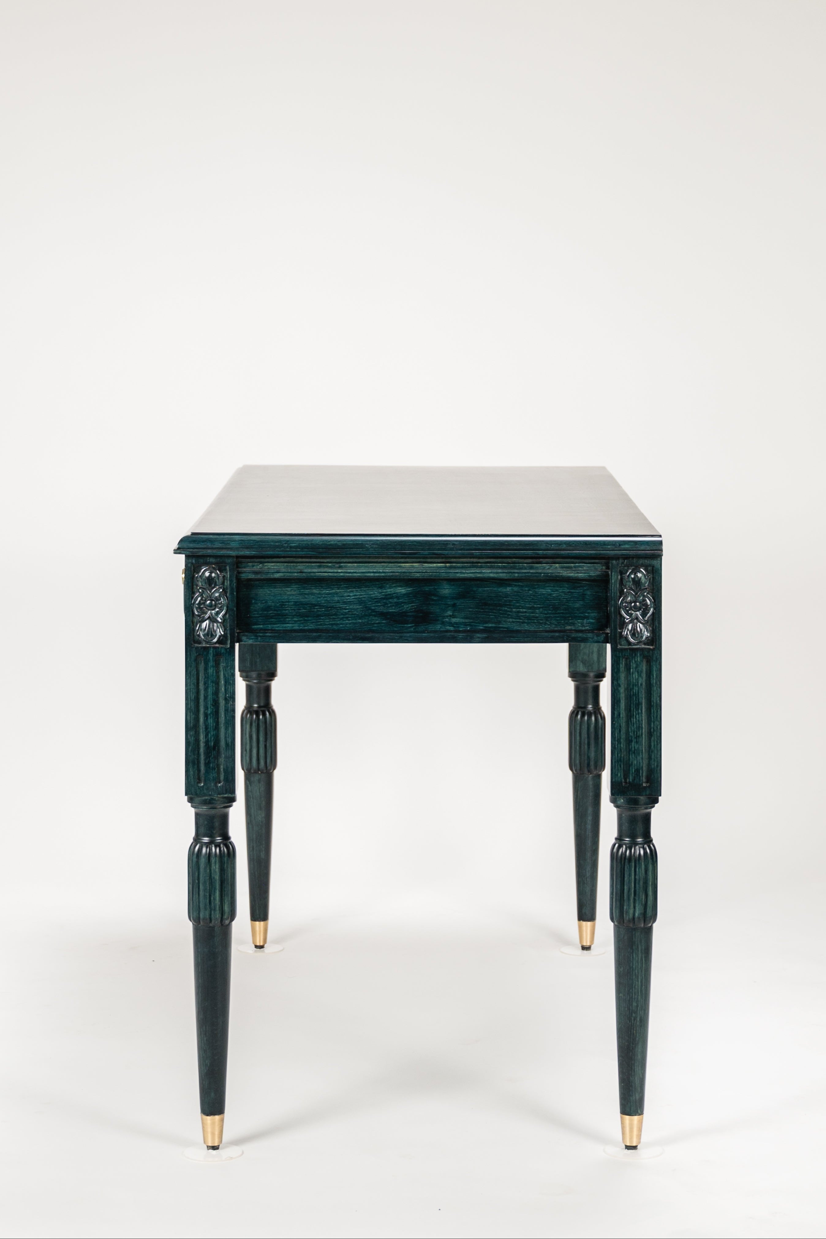 Green table with white surface on a white background