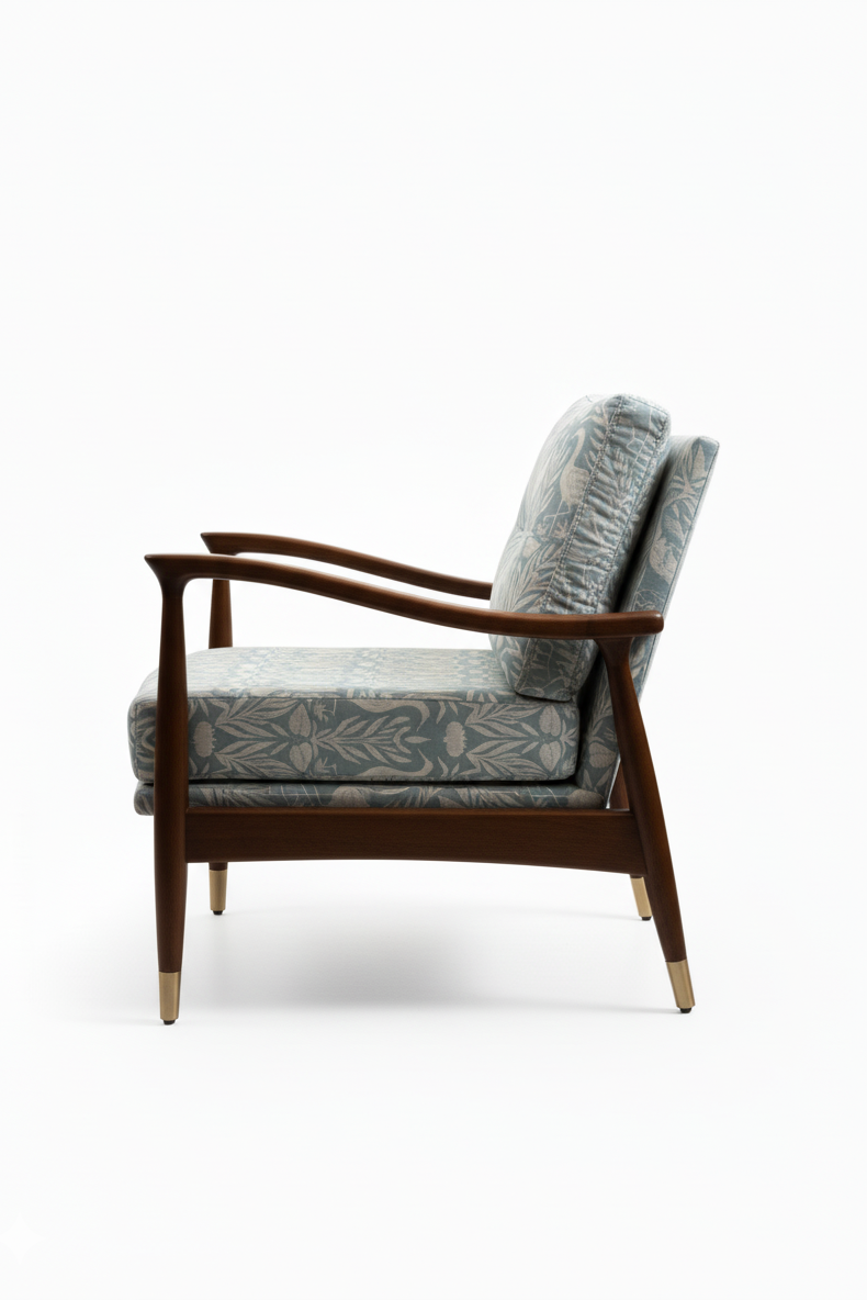 Vintage-style armchair with wooden frame and patterned cushions on a white background