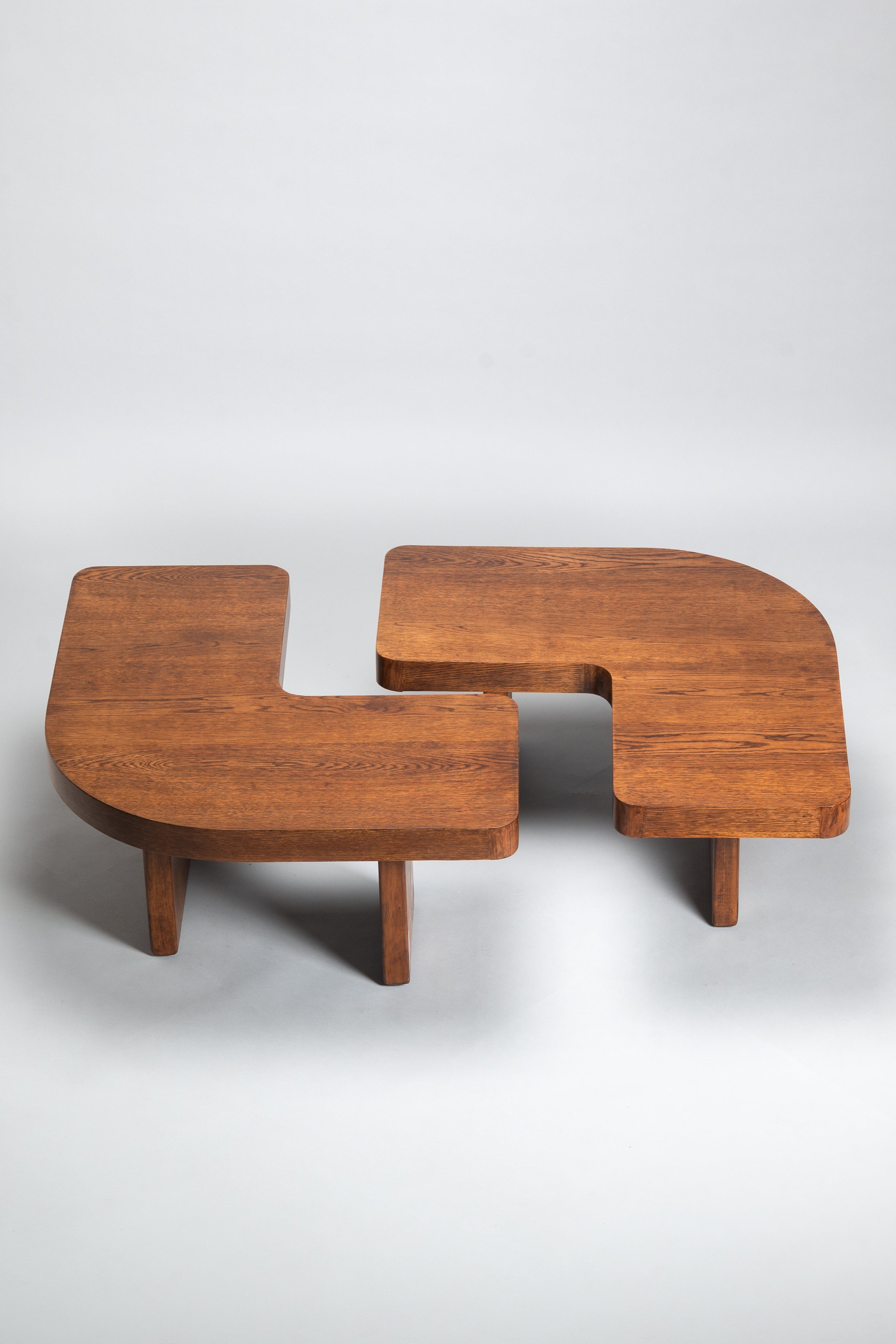 Wooden coffee table with a unique design on a white background