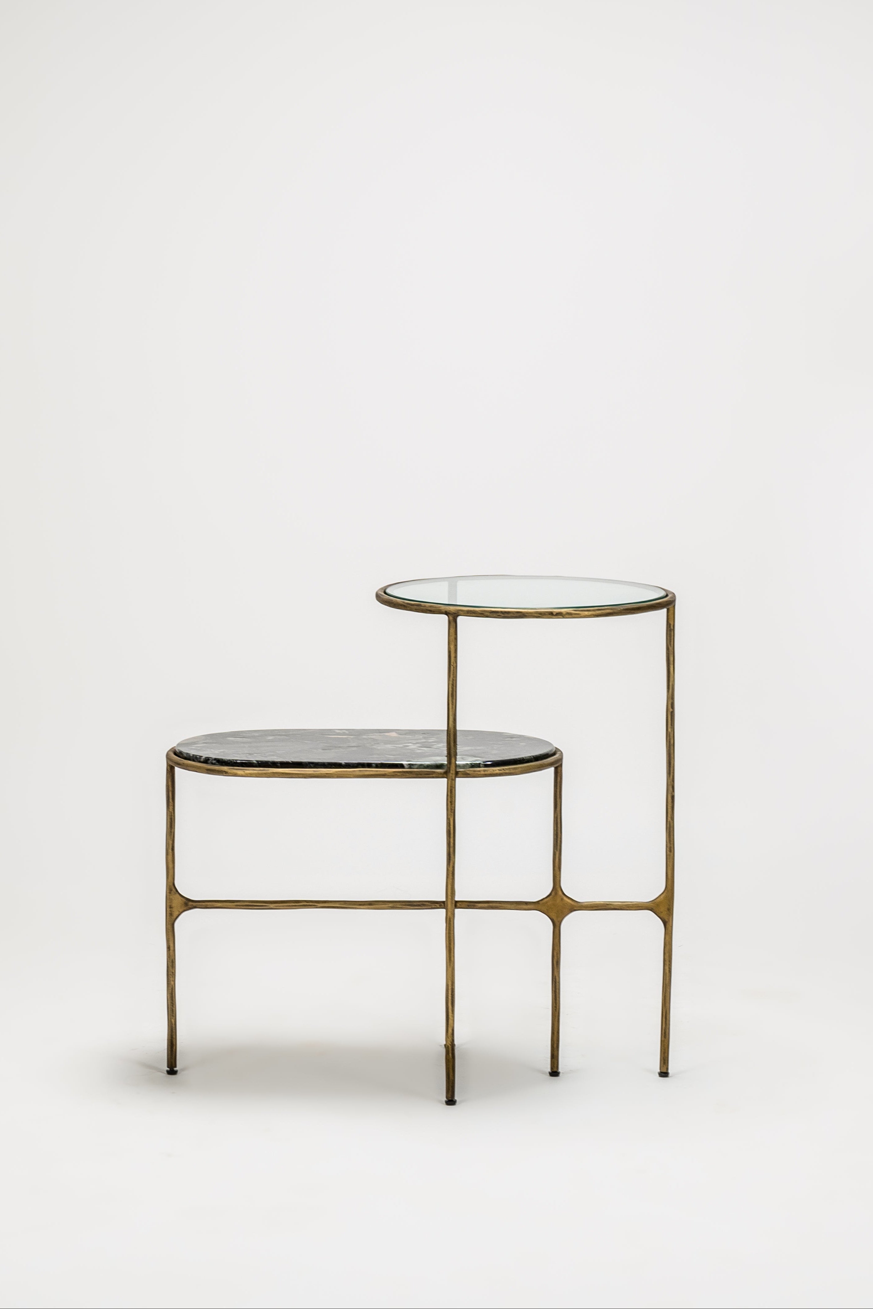 Small round table with gold frame on a white background