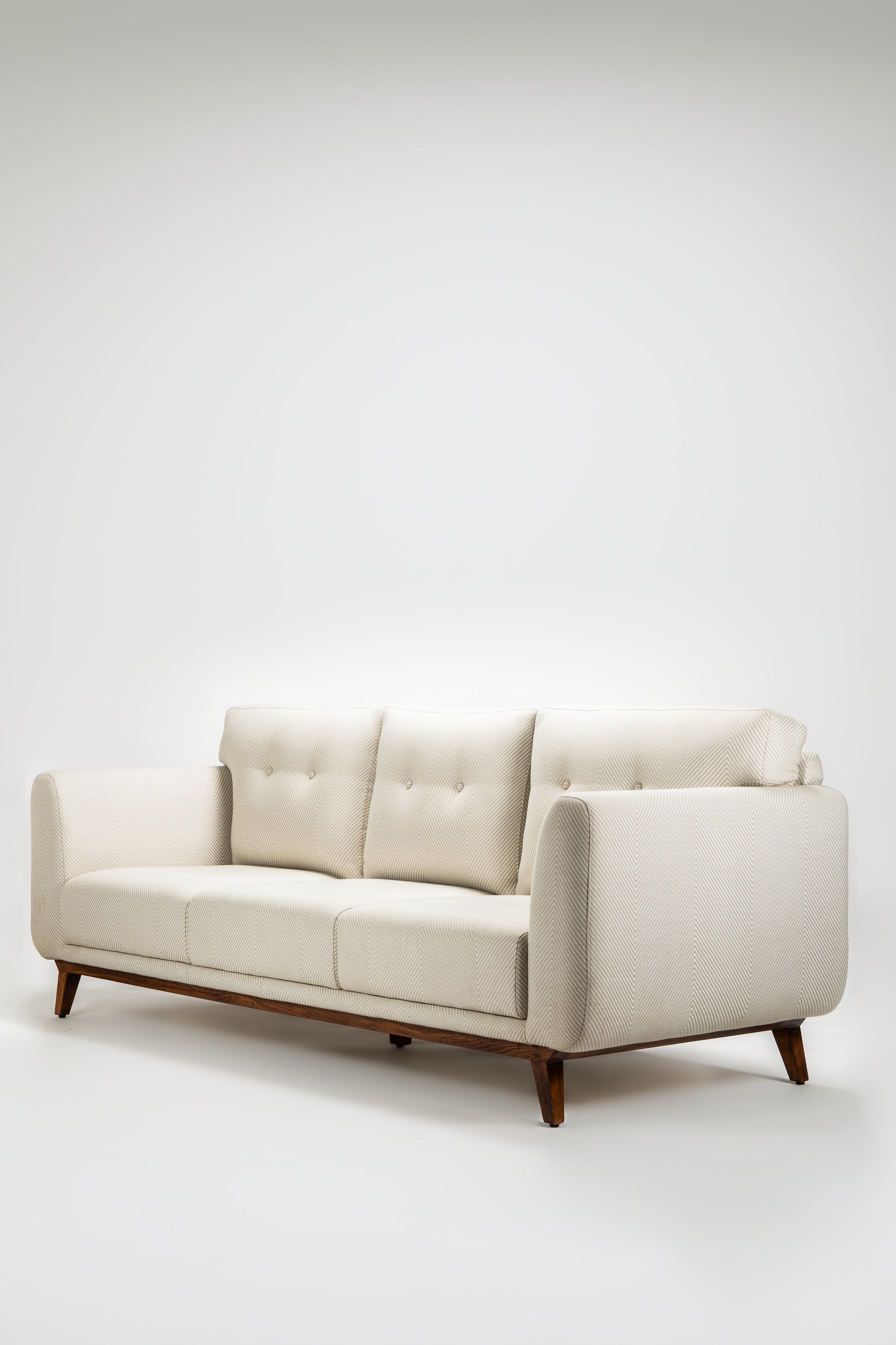 Beige sofa on a white background