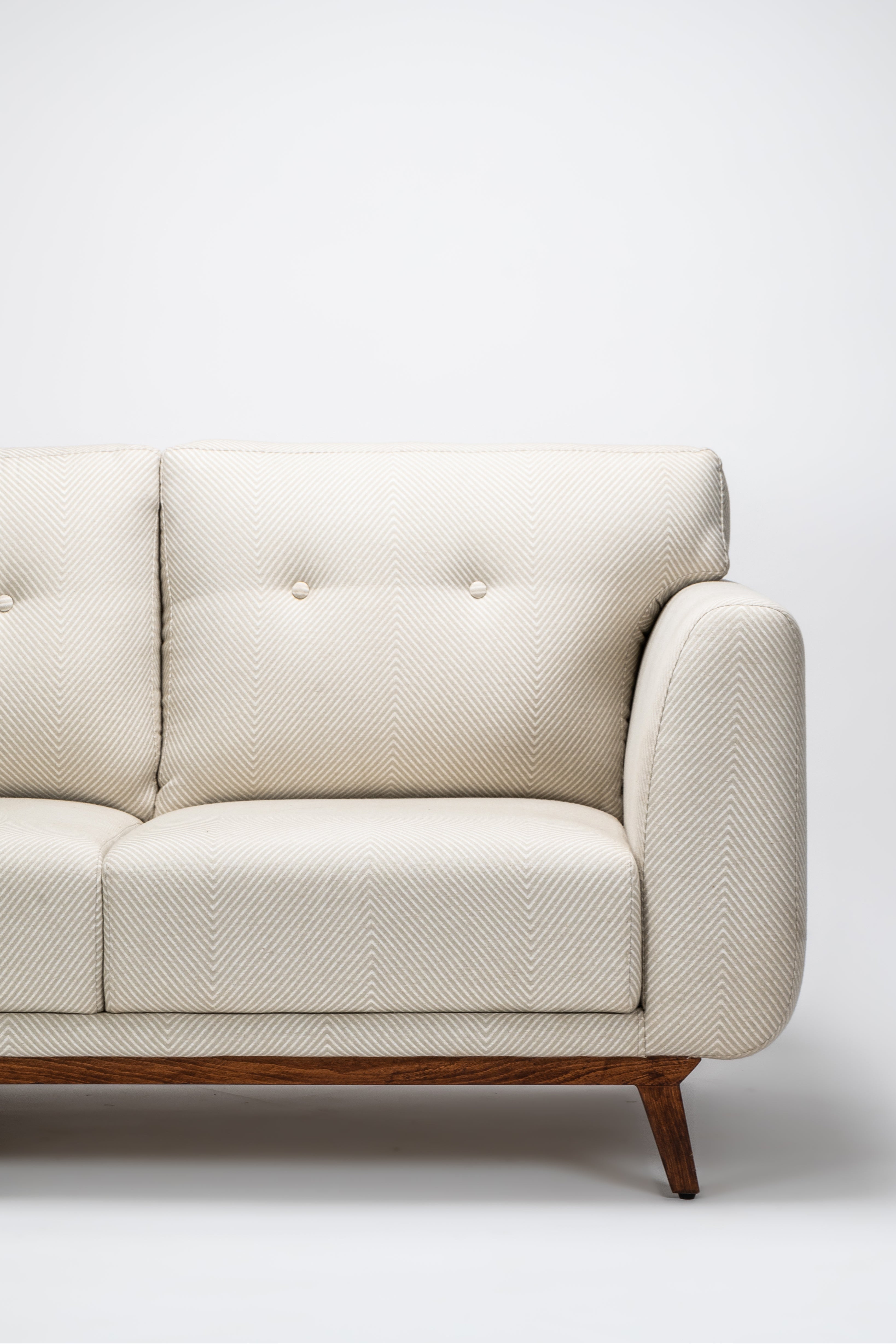 Beige sofa on a white background