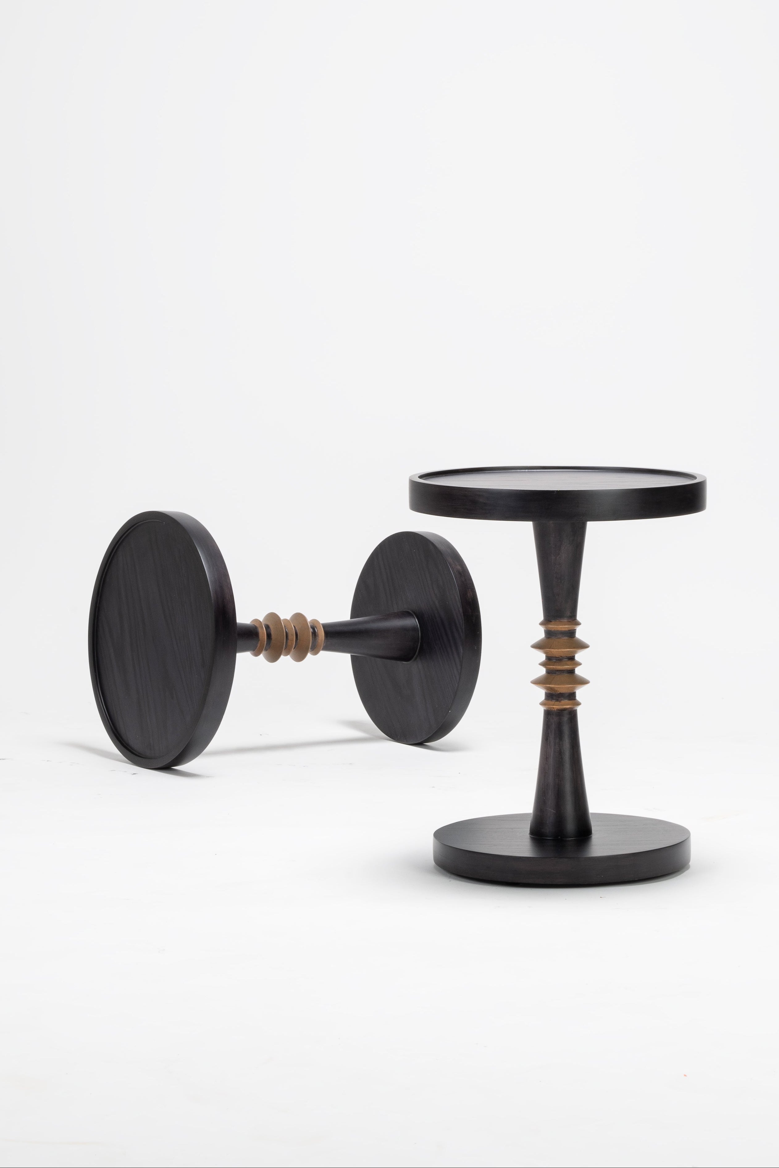 Small round table with a unique design on a white background