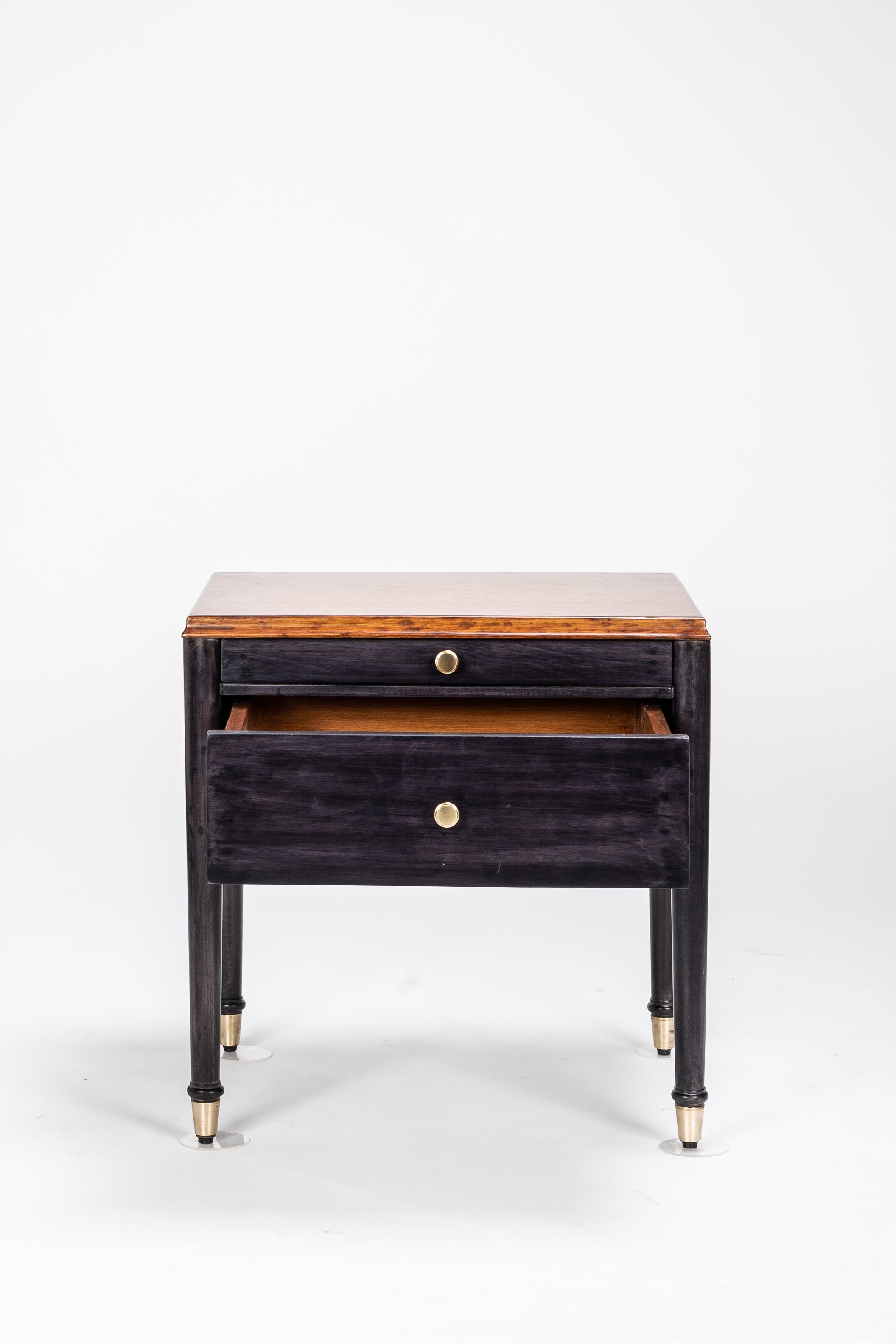Wooden nightstand with a dark finish and gold accents on a white background