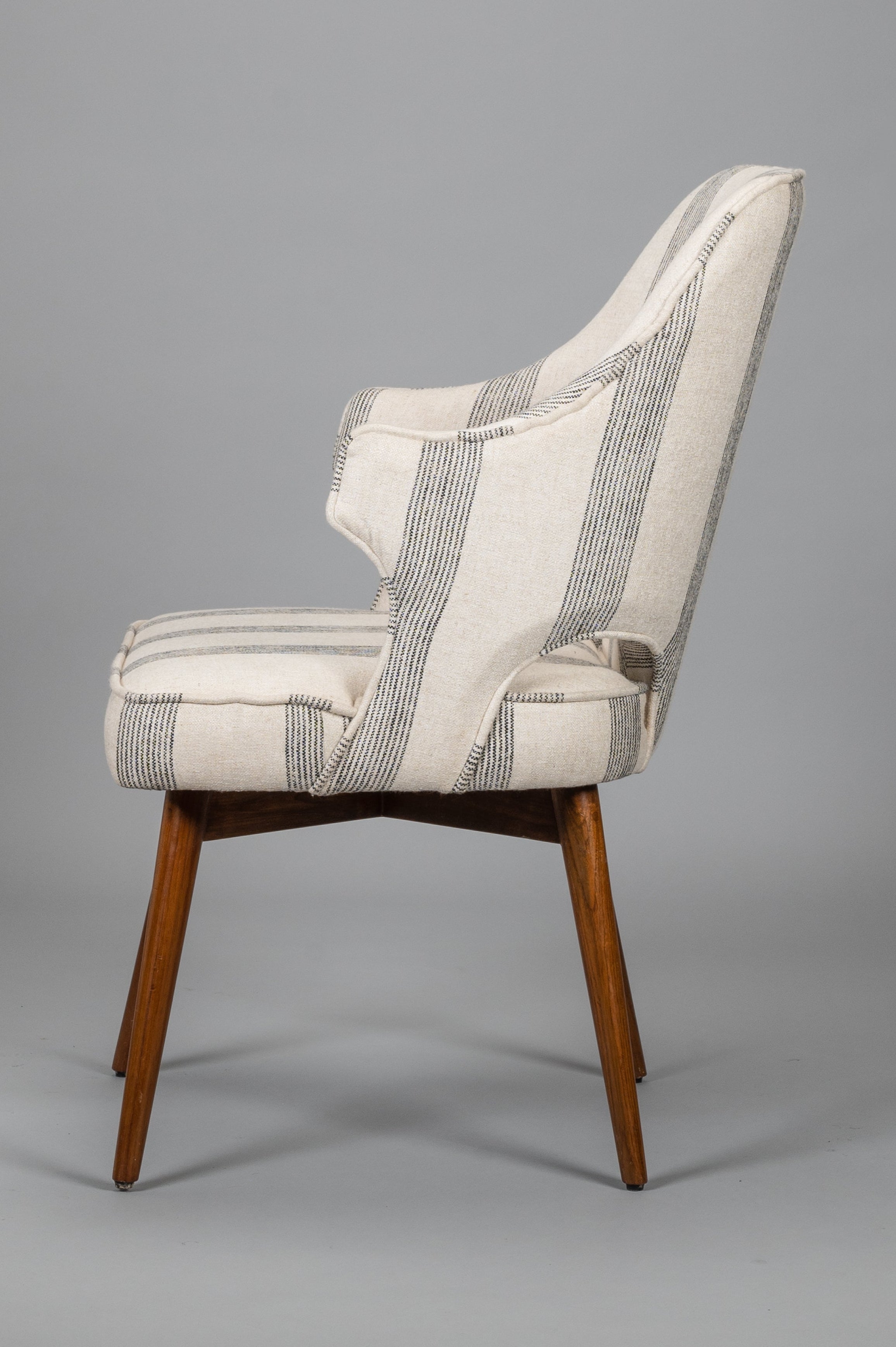 Chair with striped pattern on a gray background