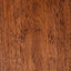 Close-up of a wooden surface with a rich brown color and visible grain.