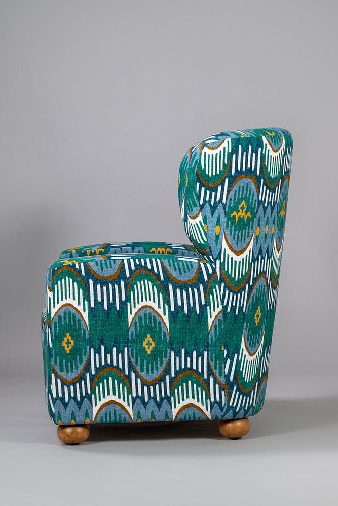 Patterned armchair on a gray background