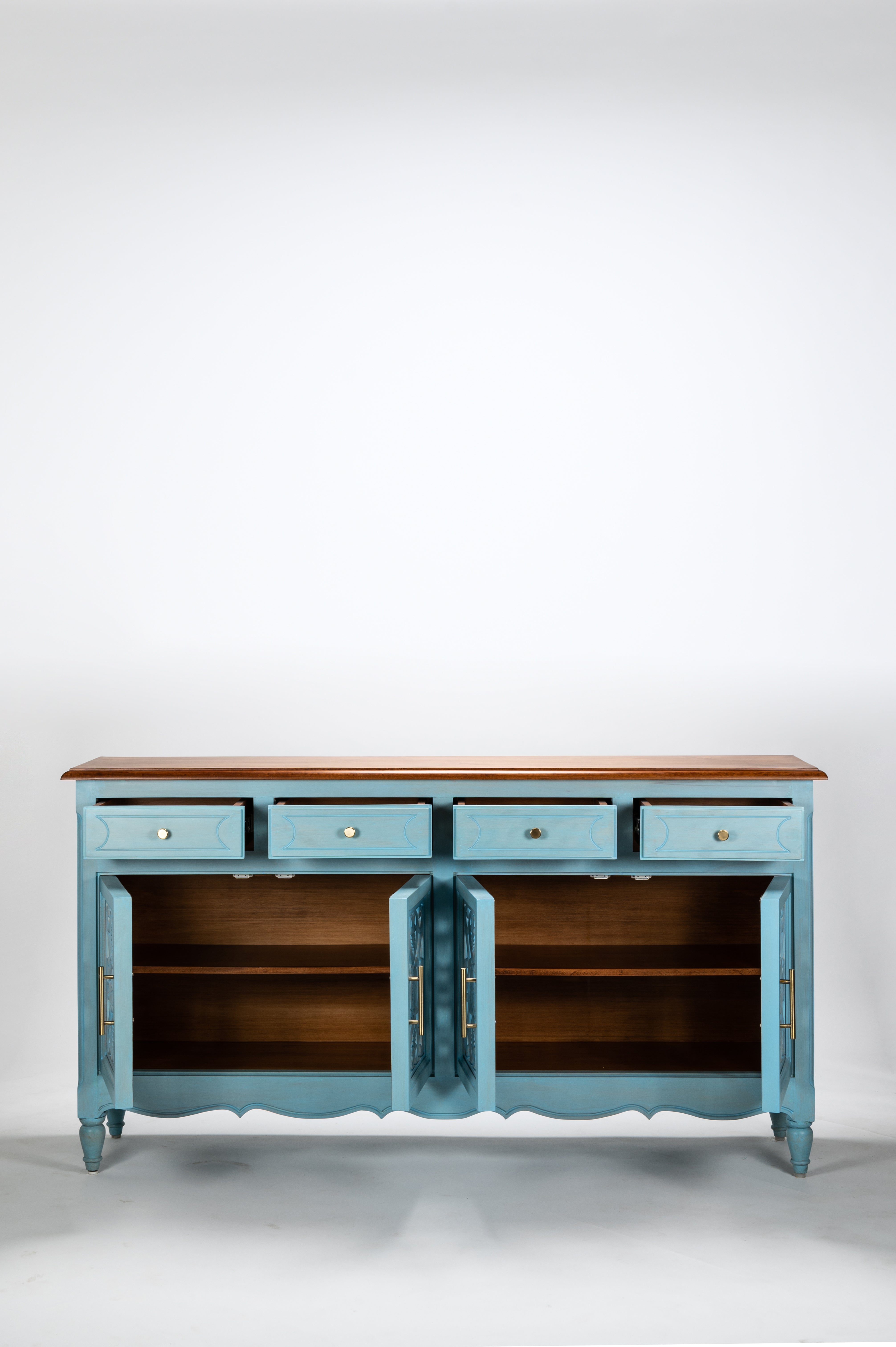 Blue sideboard with wooden top on a white background
