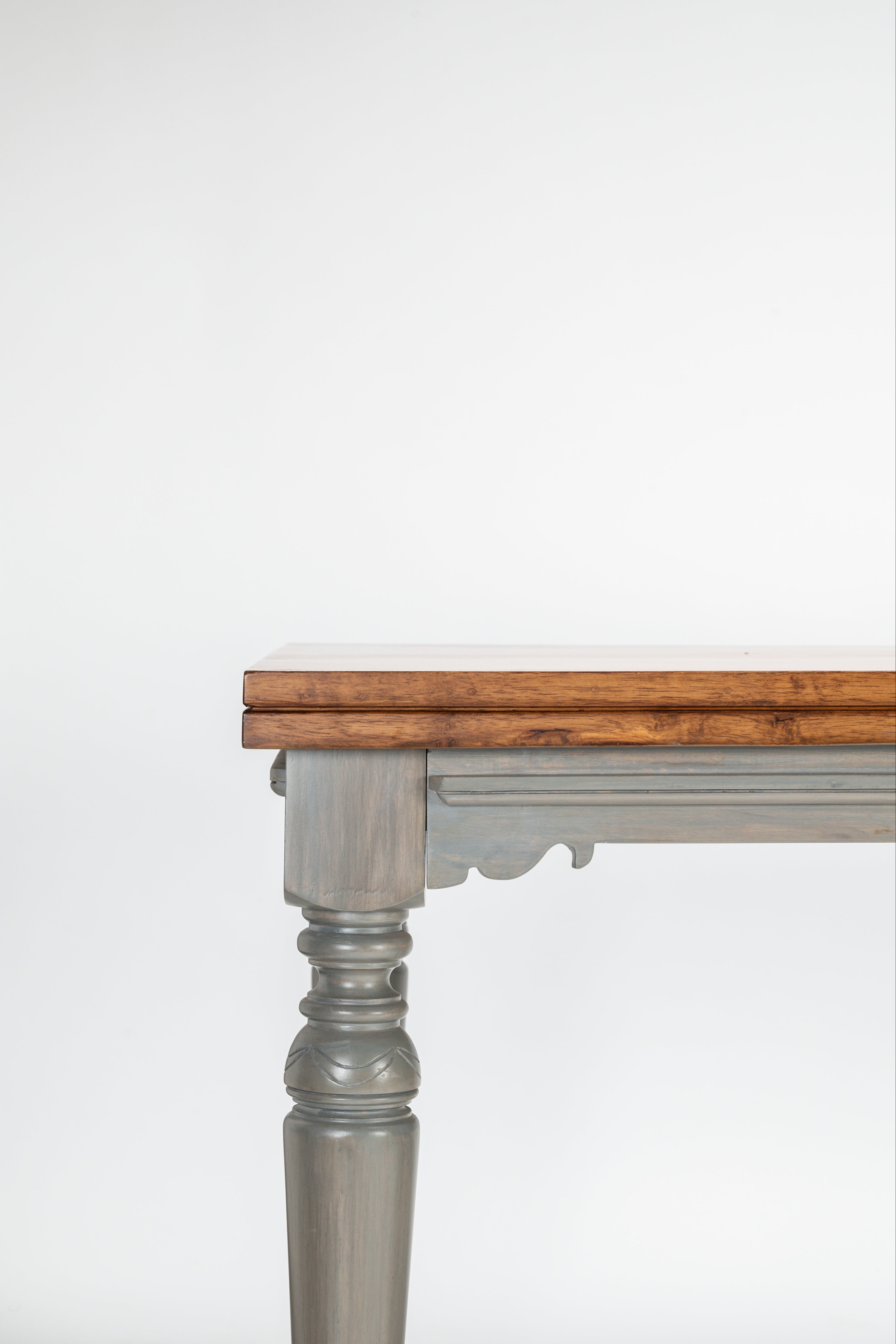 Wooden table with a gray base on a white background