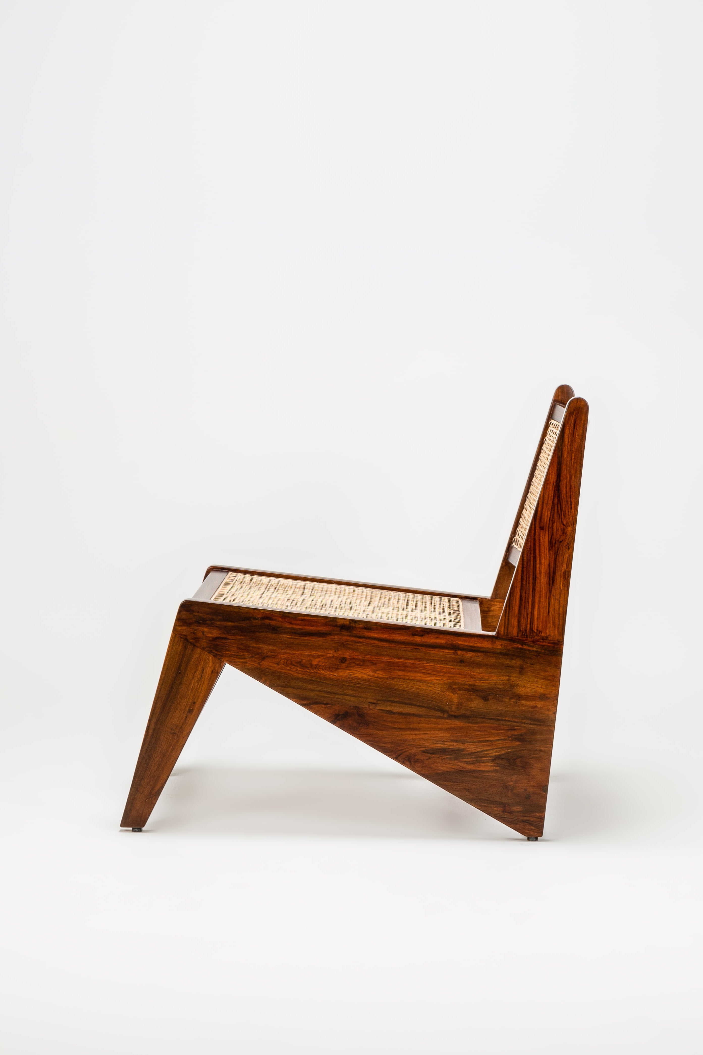 Wooden chair with a geometric design on a white background