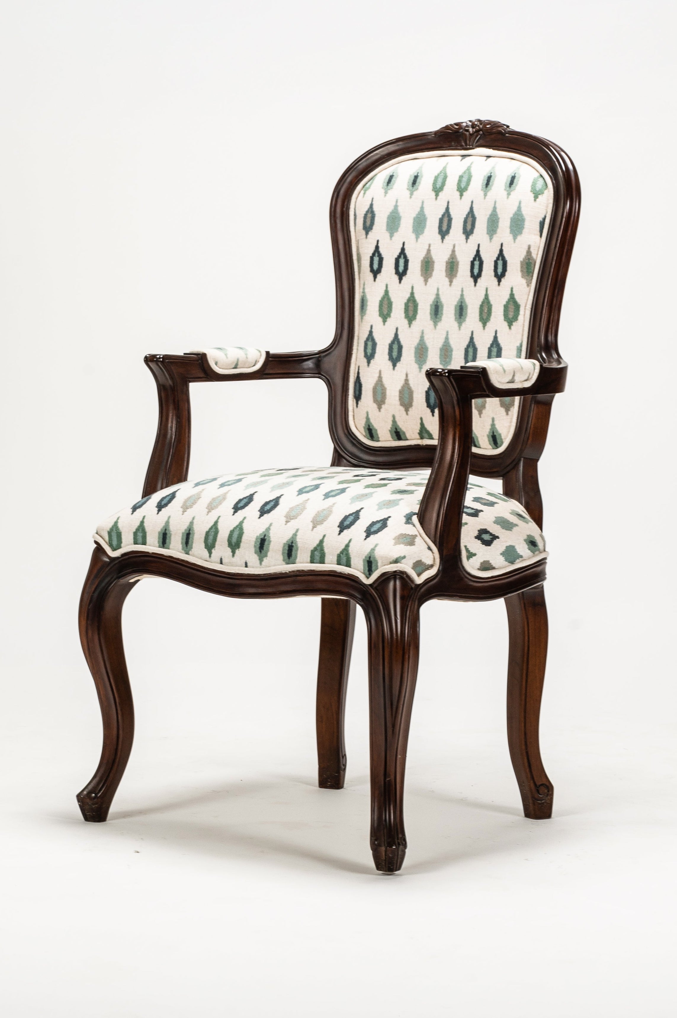 Chair with patterned cushion on a white background