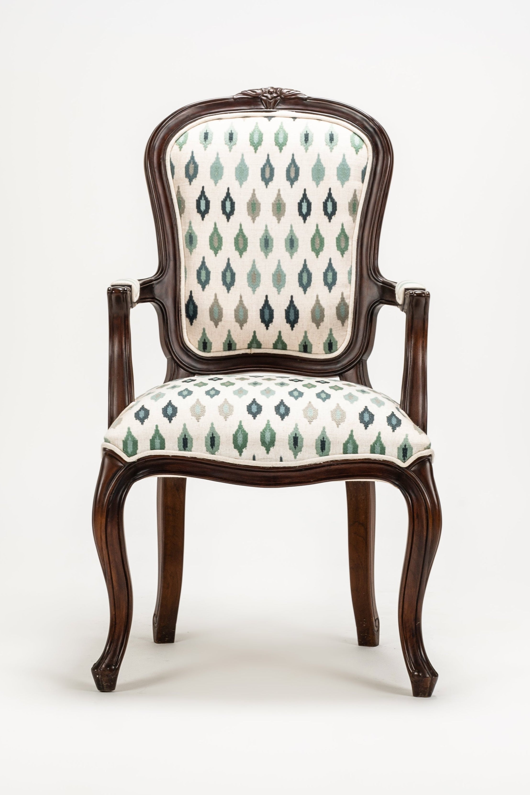 Chair with patterned upholstery on a white background